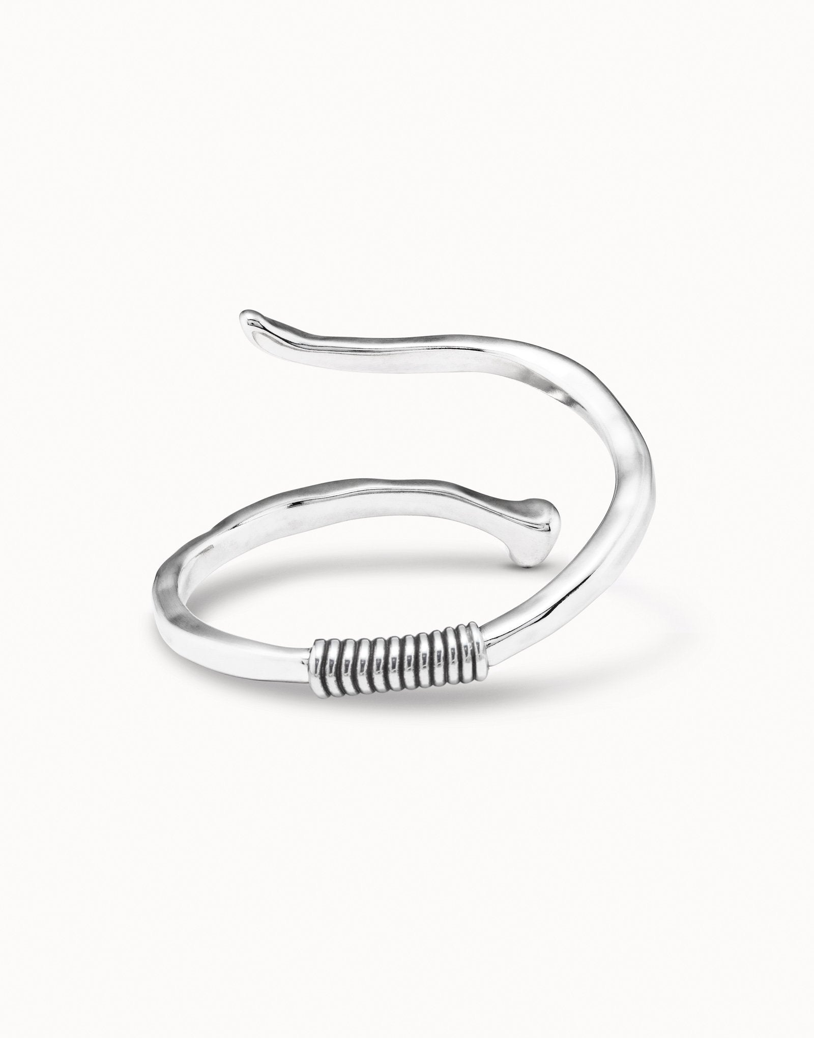 Bangle bracelet with a spiral-shaped nail