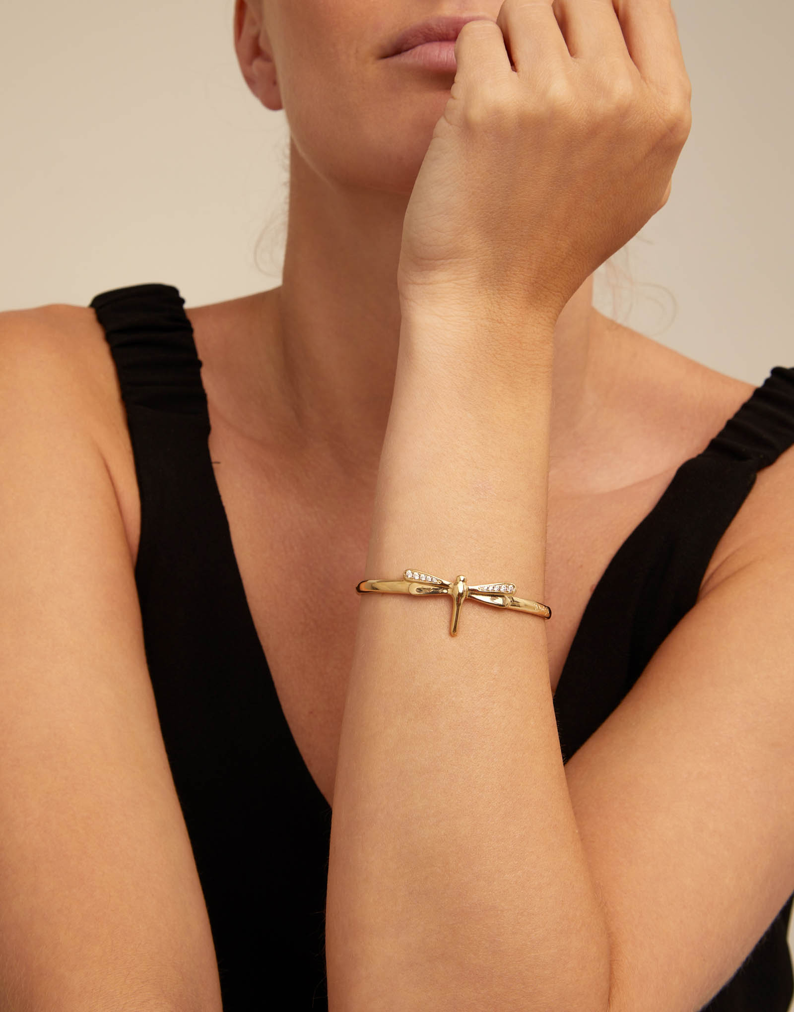 Dragonfly shaped cuff bracelet with topaz