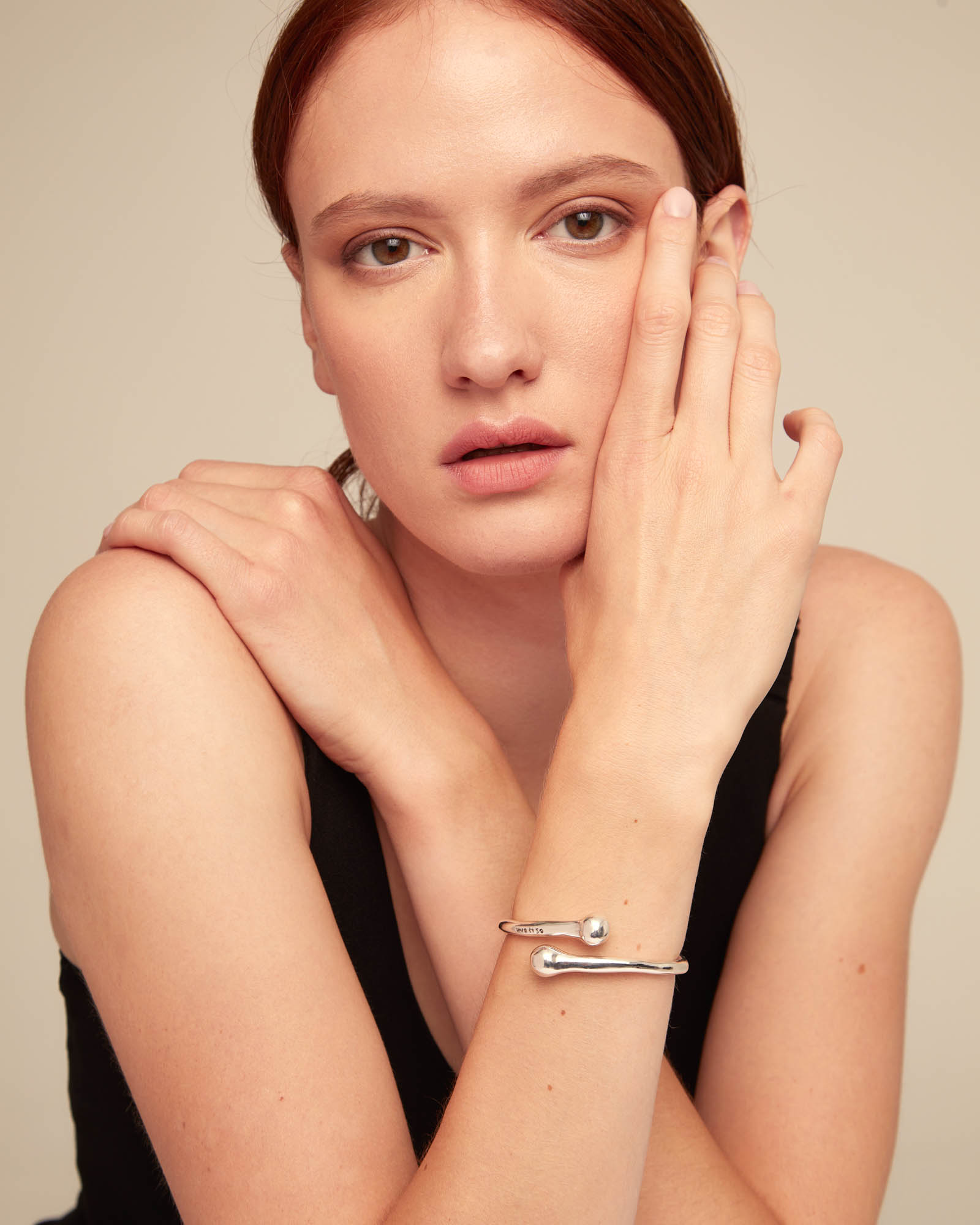 Bangle bracelet with inner spring