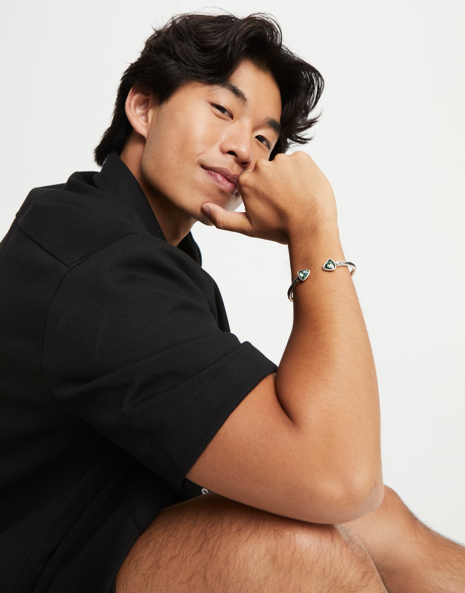 Cuff bracelet with two green  crystals