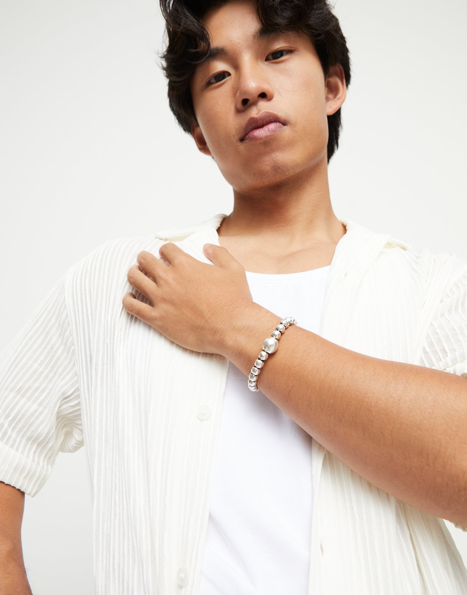 Leather bracelet with a large bead