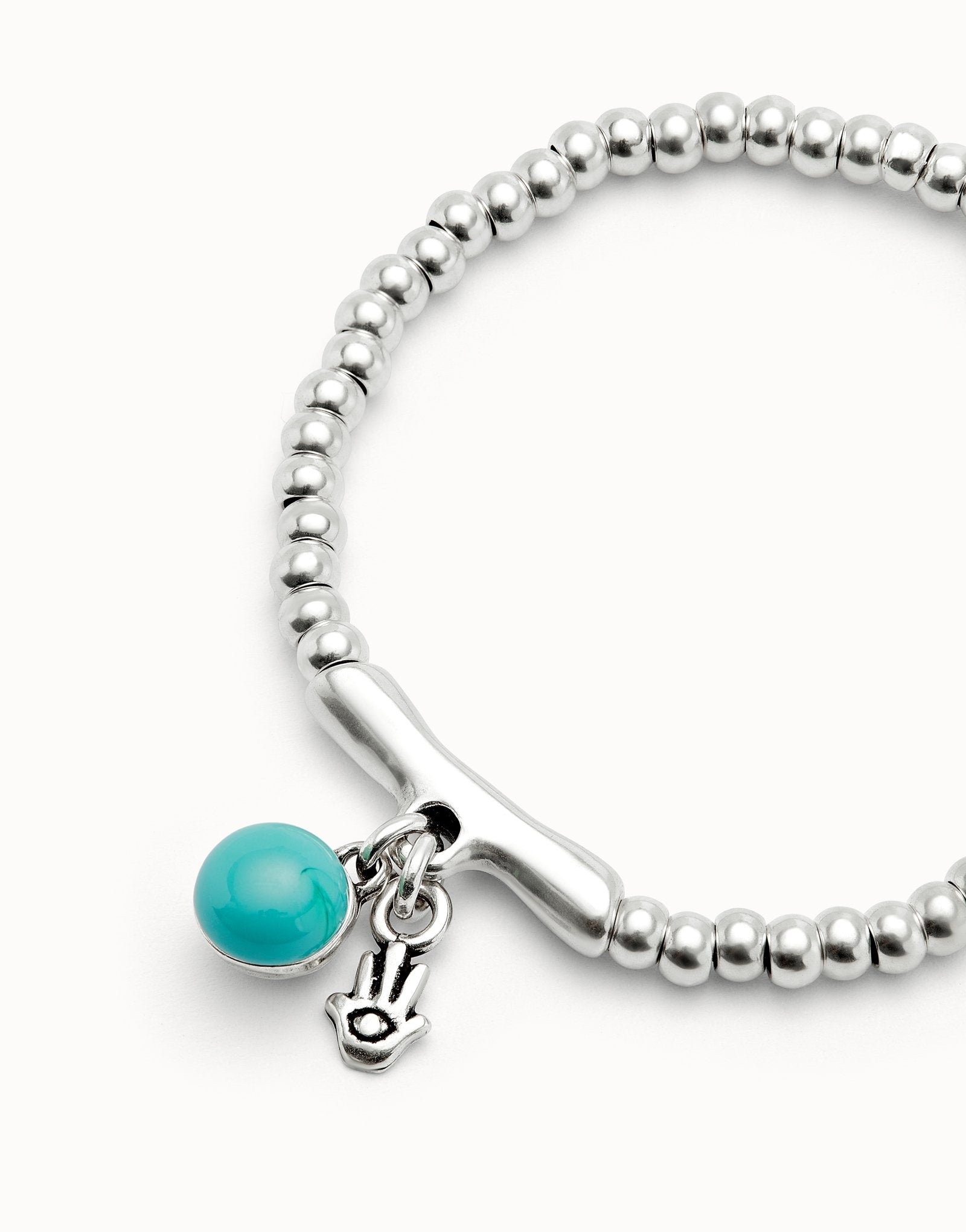 Beaded stretch bracelet with a murano glass and a hamsa