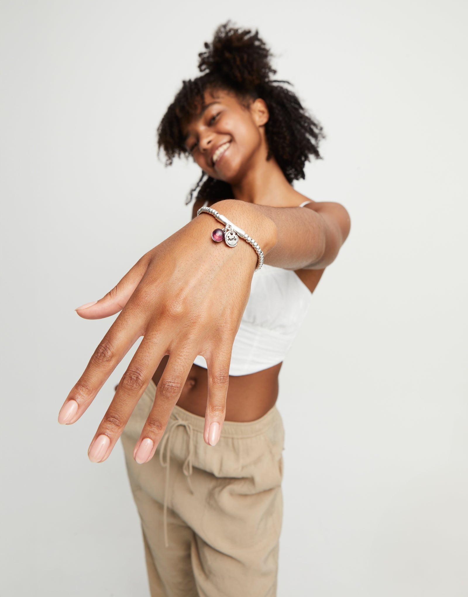 Beaded stretch bracelet with a murano glass and the word lucky