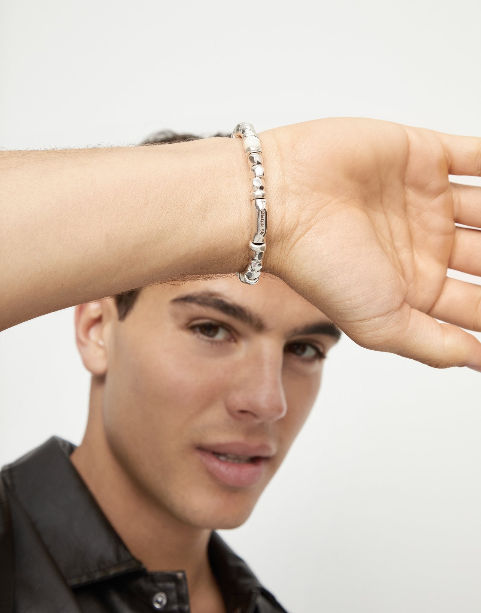 Beaded bracelet with silver and ivory beads
