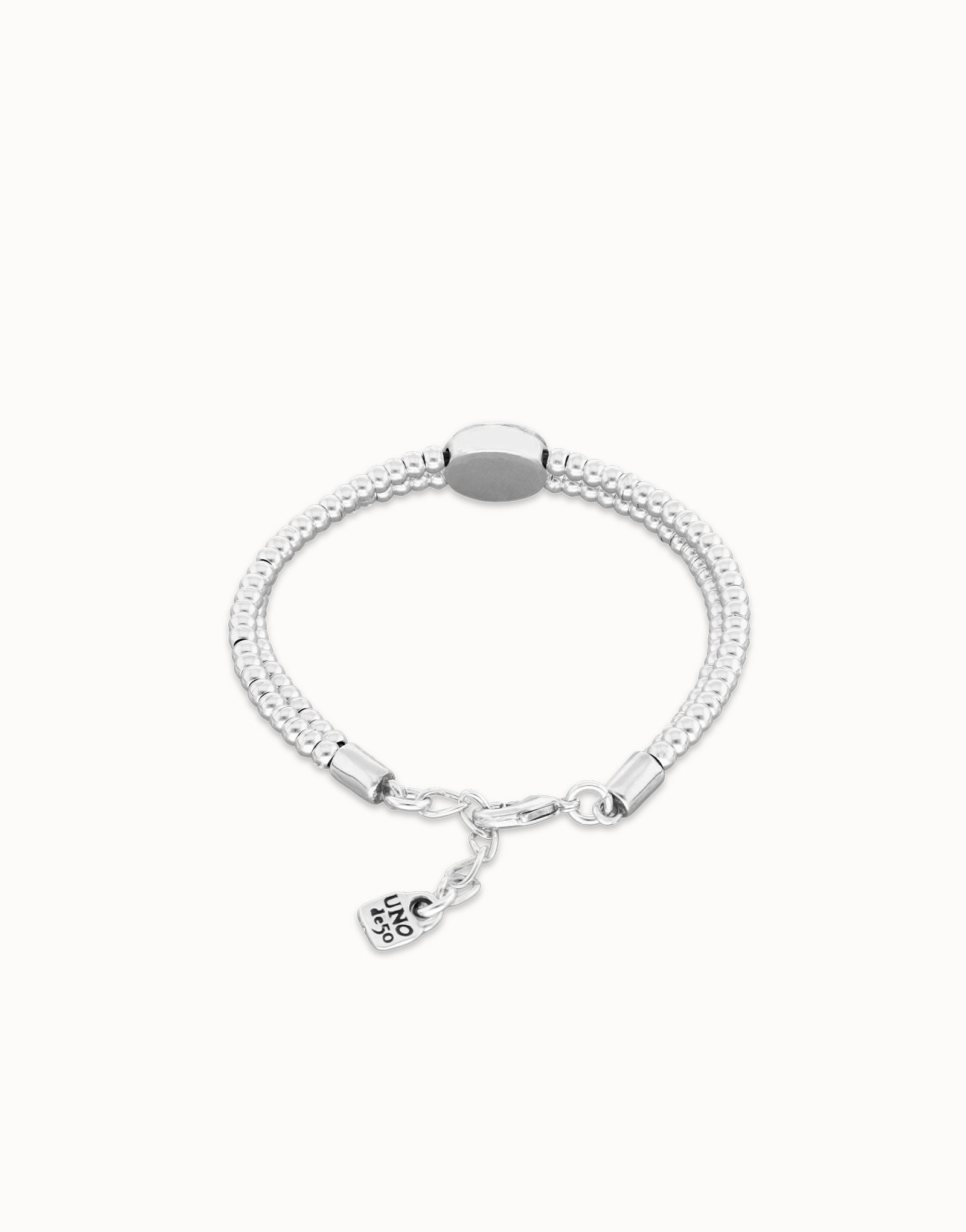 Two-strand beaded bracelet with an eye-shaped charm