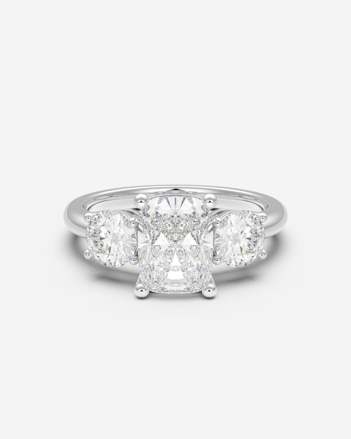 The Round 3-Stone — Elongated Cushion