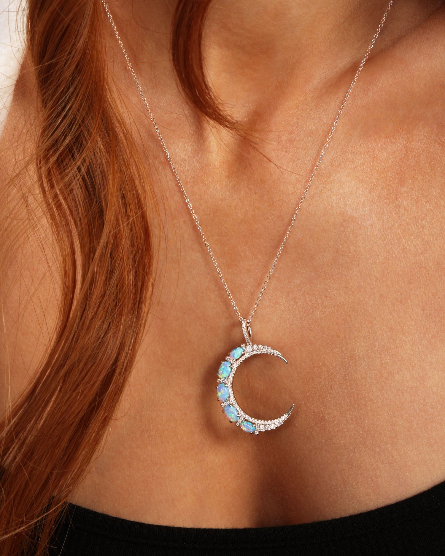 she-is-an-icon-moon-necklace-in-silver-and-blue-opal
