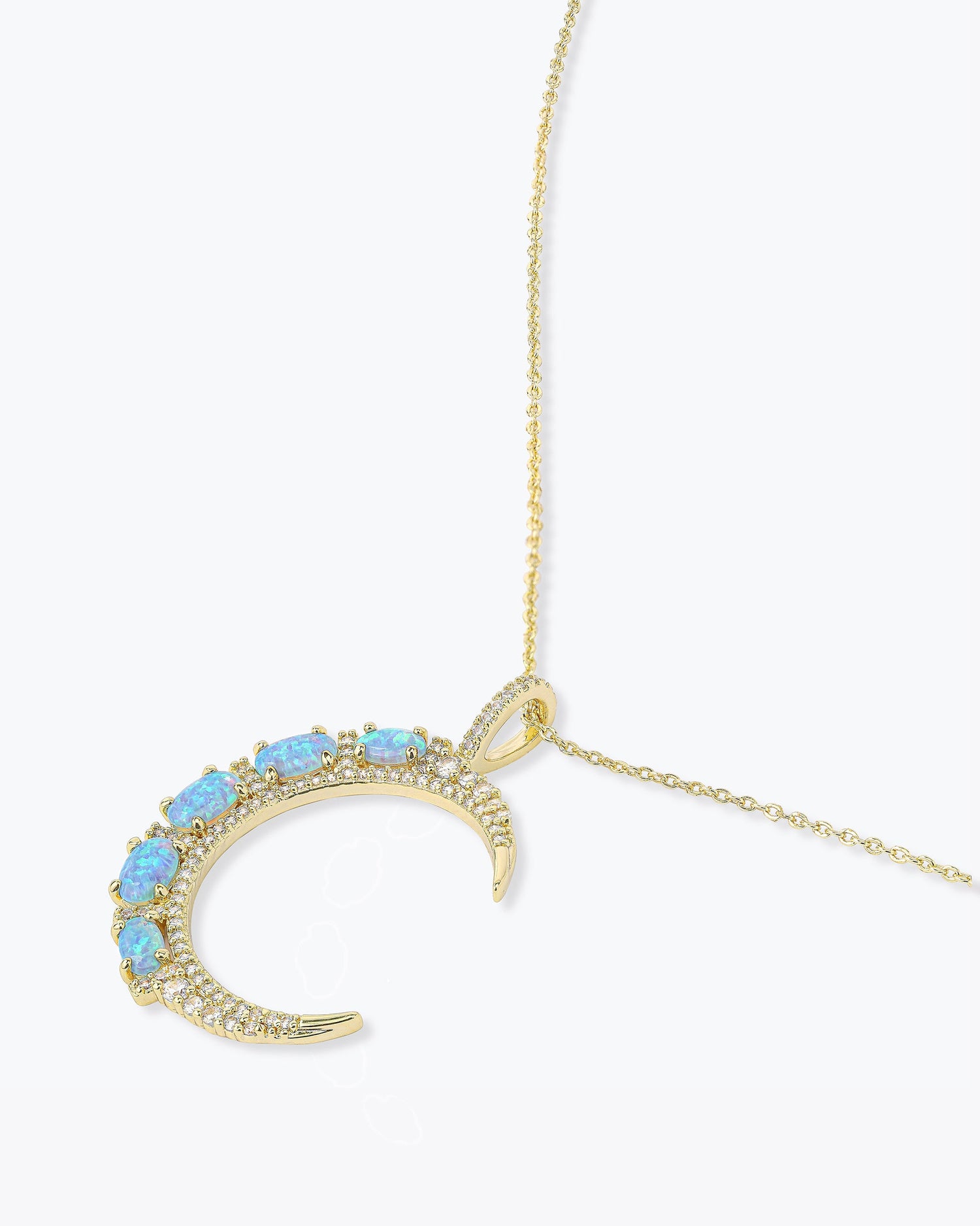 she-is-an-icon-moon-necklace-in-gold-and-blue-opal