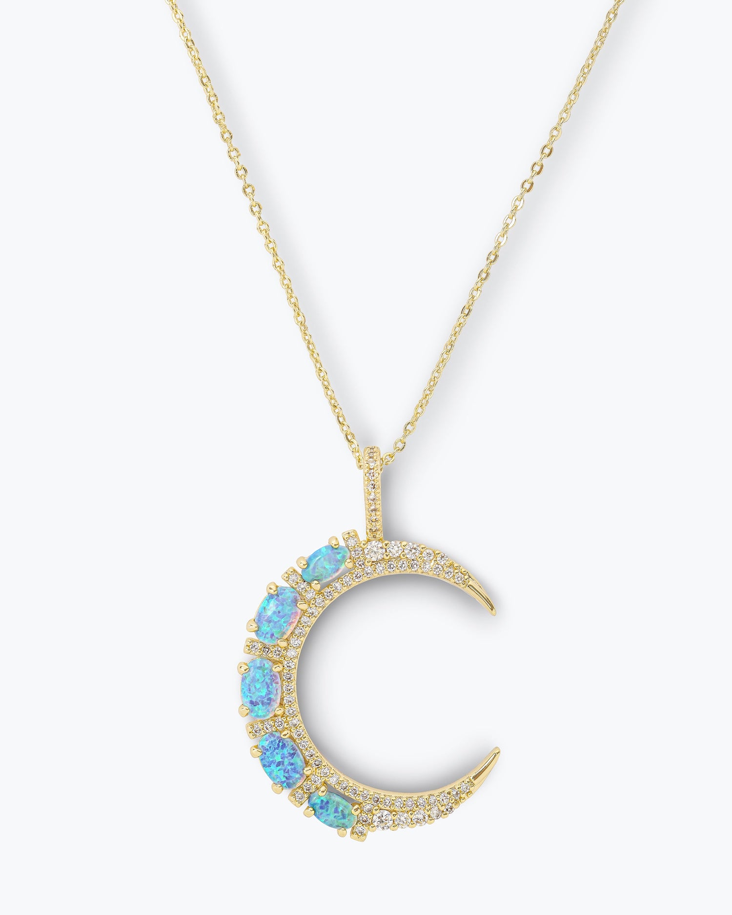 she-is-an-icon-moon-necklace-in-gold-and-blue-opal