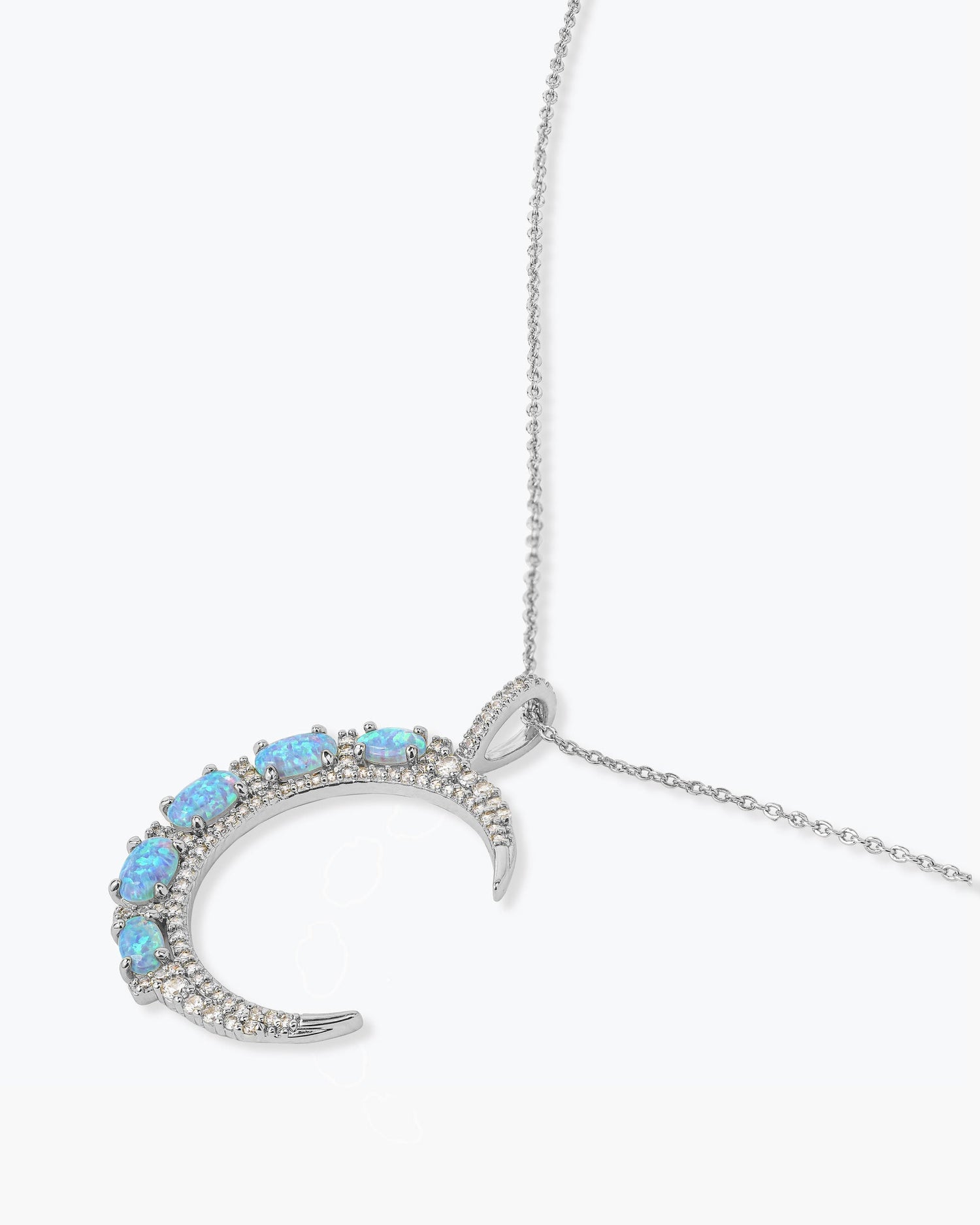 she-is-an-icon-moon-necklace-in-silver-and-blue-opal