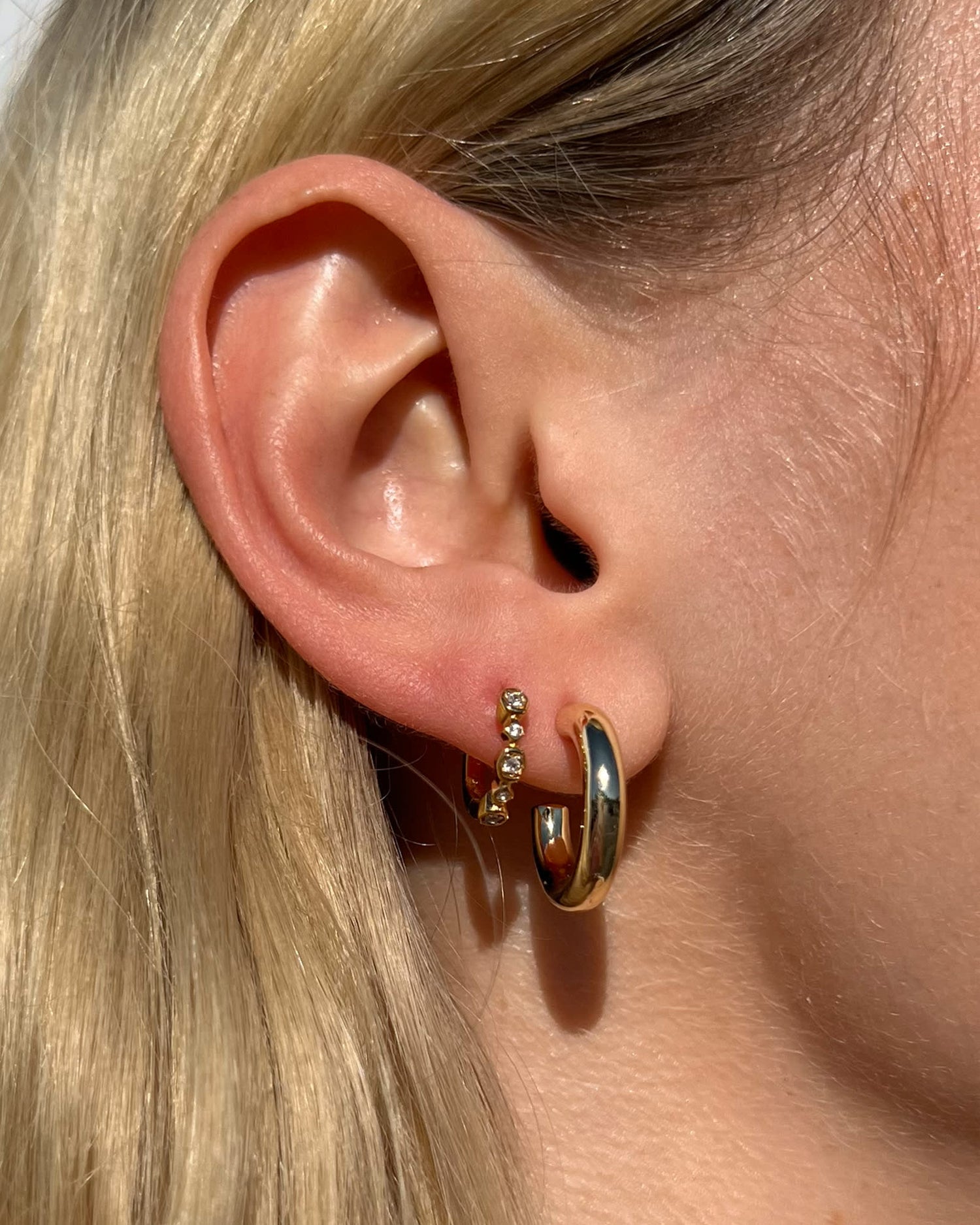 colette-huggie-earrings-in-gold-swarovski