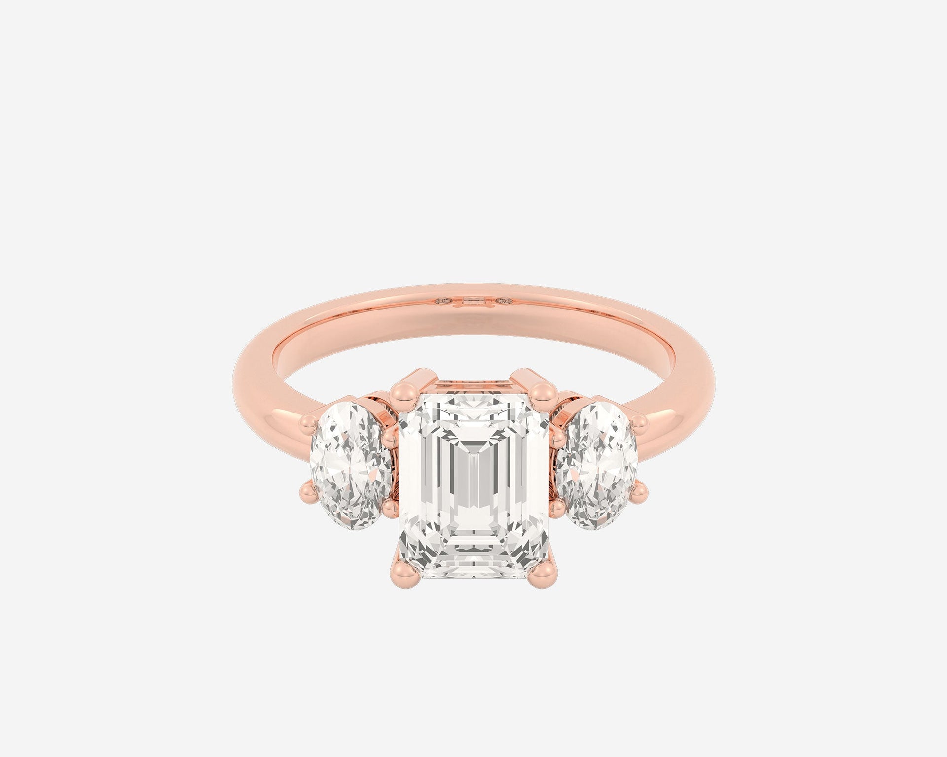 The Oval 3-Stone — Emerald