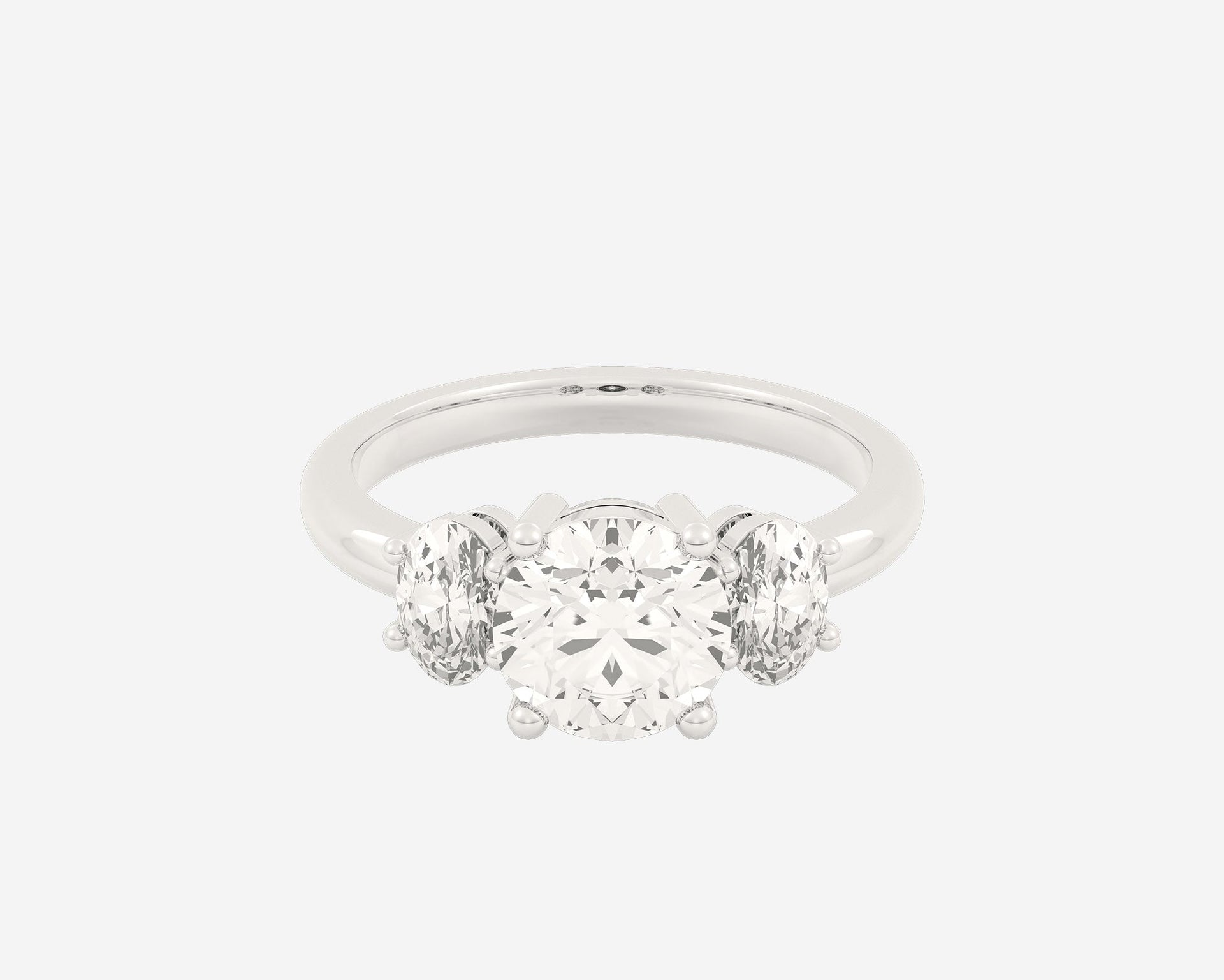 The Oval 3-Stone — Round