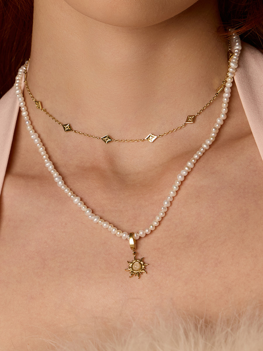 Sunray Ivory & Gold Charm