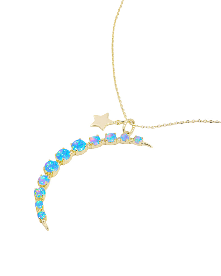 what-dreams-are-made-of-necklace-in-gold-and-blue-opal