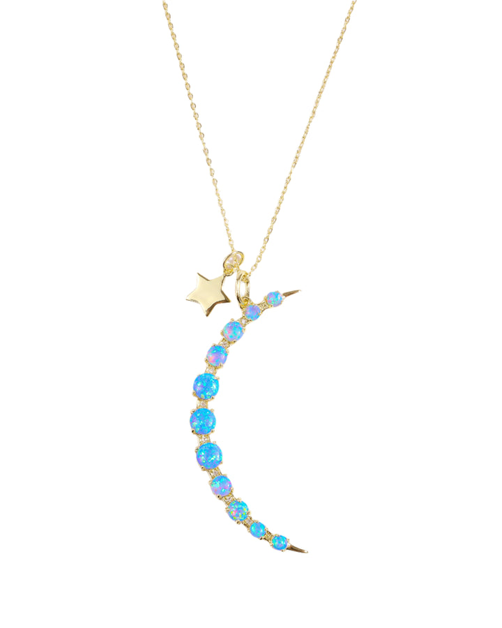 what-dreams-are-made-of-necklace-in-gold-and-blue-opal