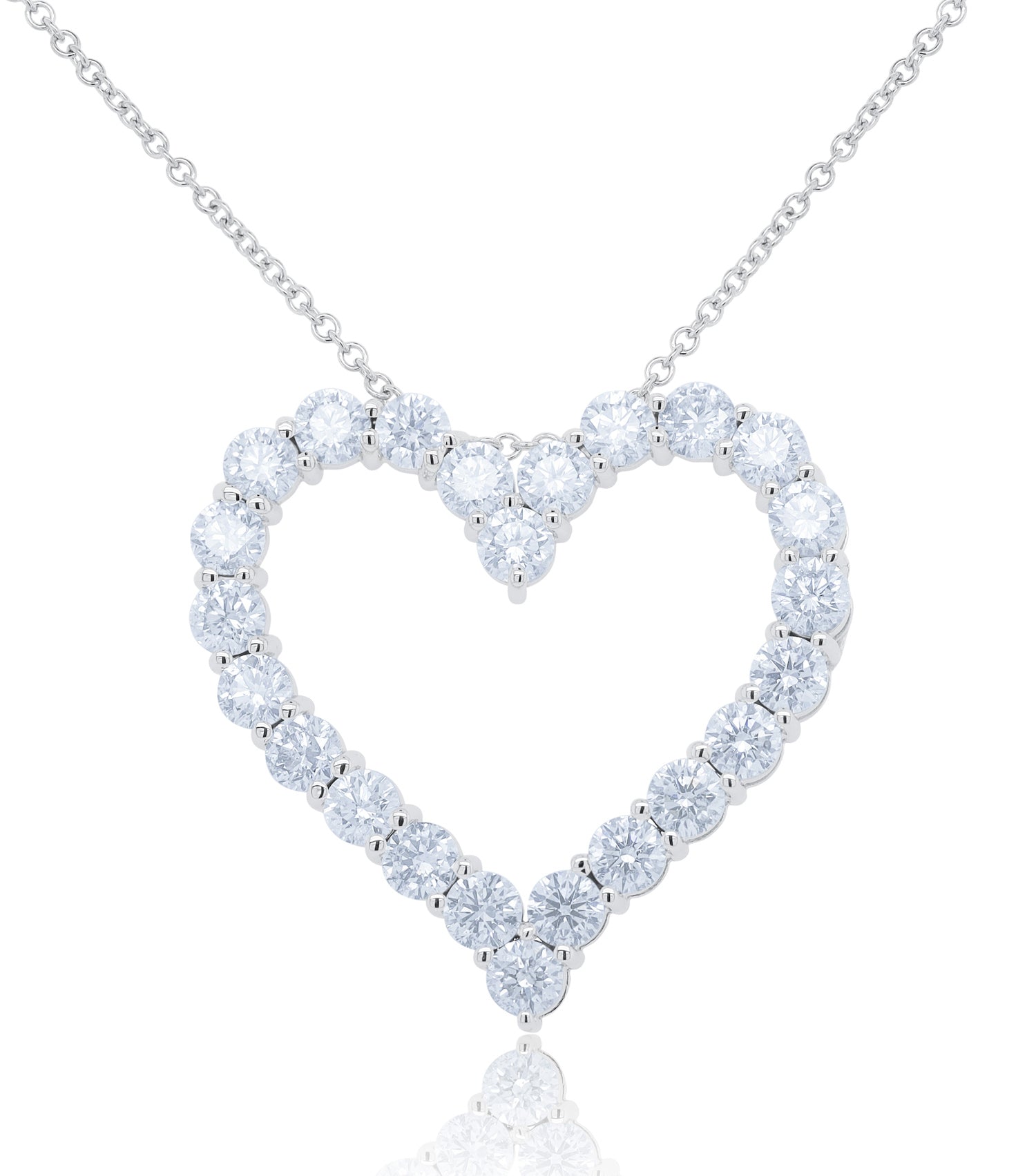 18kt white gold open heart pendant featuring 5.85 cts of round diamonds, 24 stones