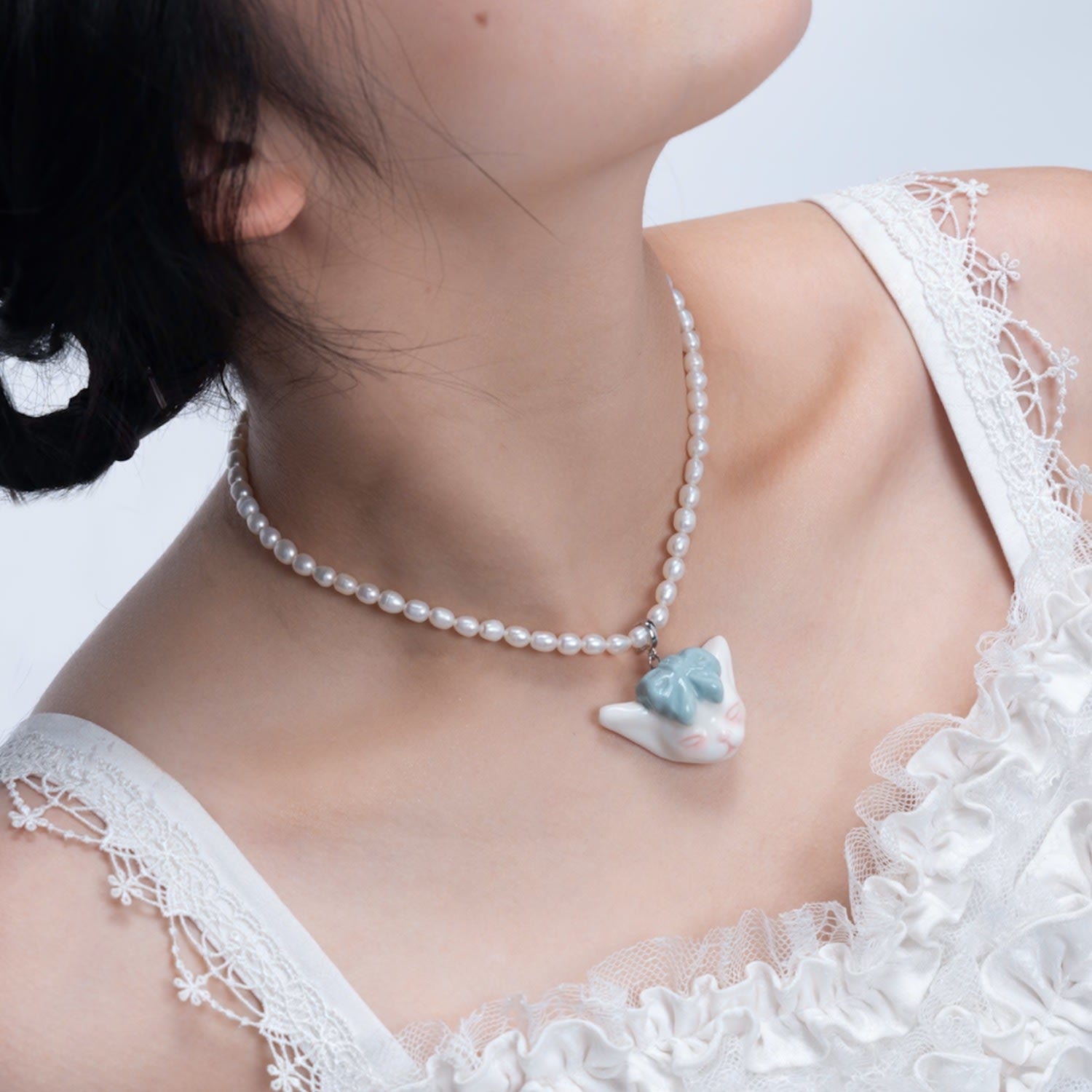 Angry Puss Light Jade Bow Tie Freshwater Pearl Necklace