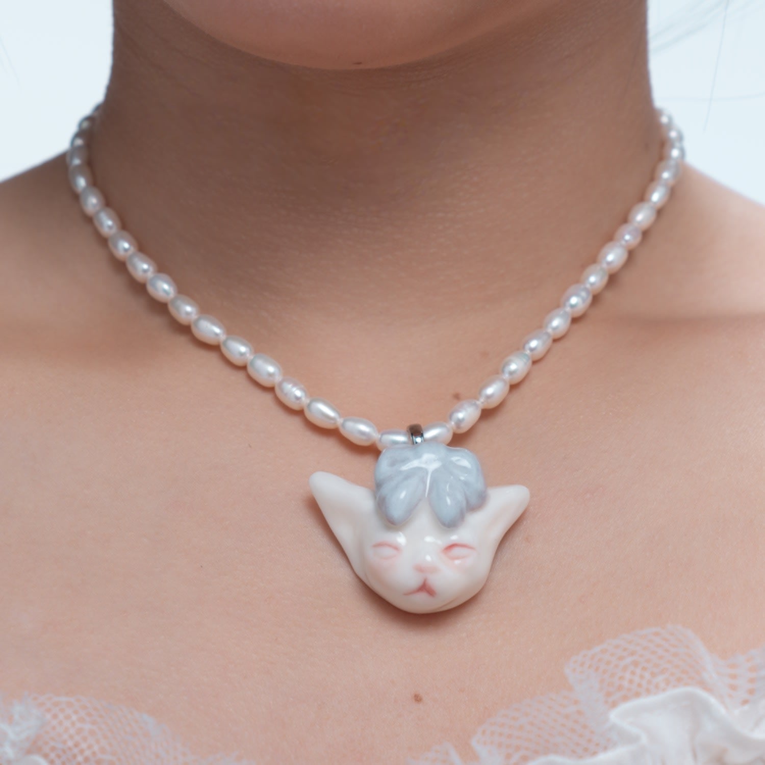 Angry Puss Light Misty Blue Bow Tie Freshwater Pearl Necklace