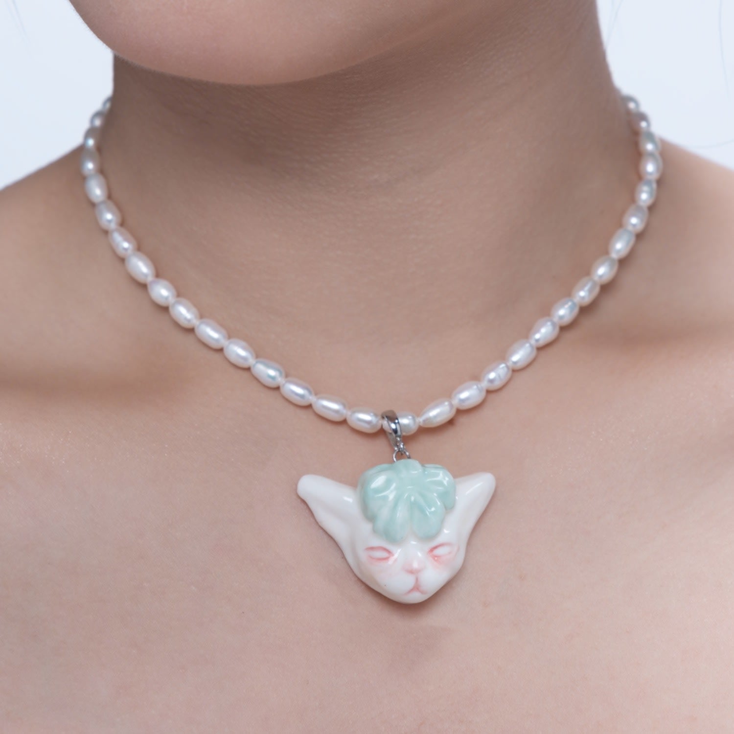 Angry Puss Mint Green Bow Tie Freshwater Pearl Necklace