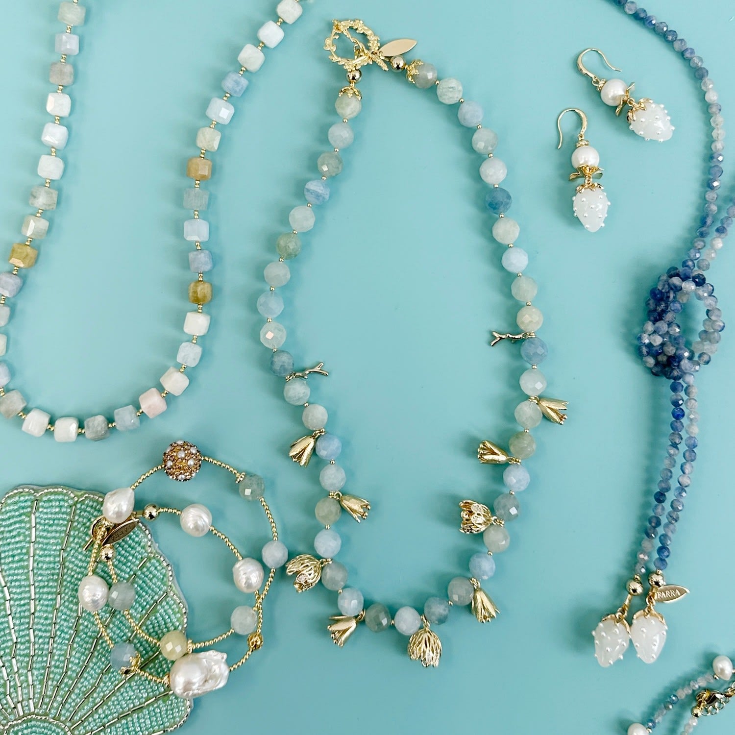 Aquamarine With Floral Charms Necklace