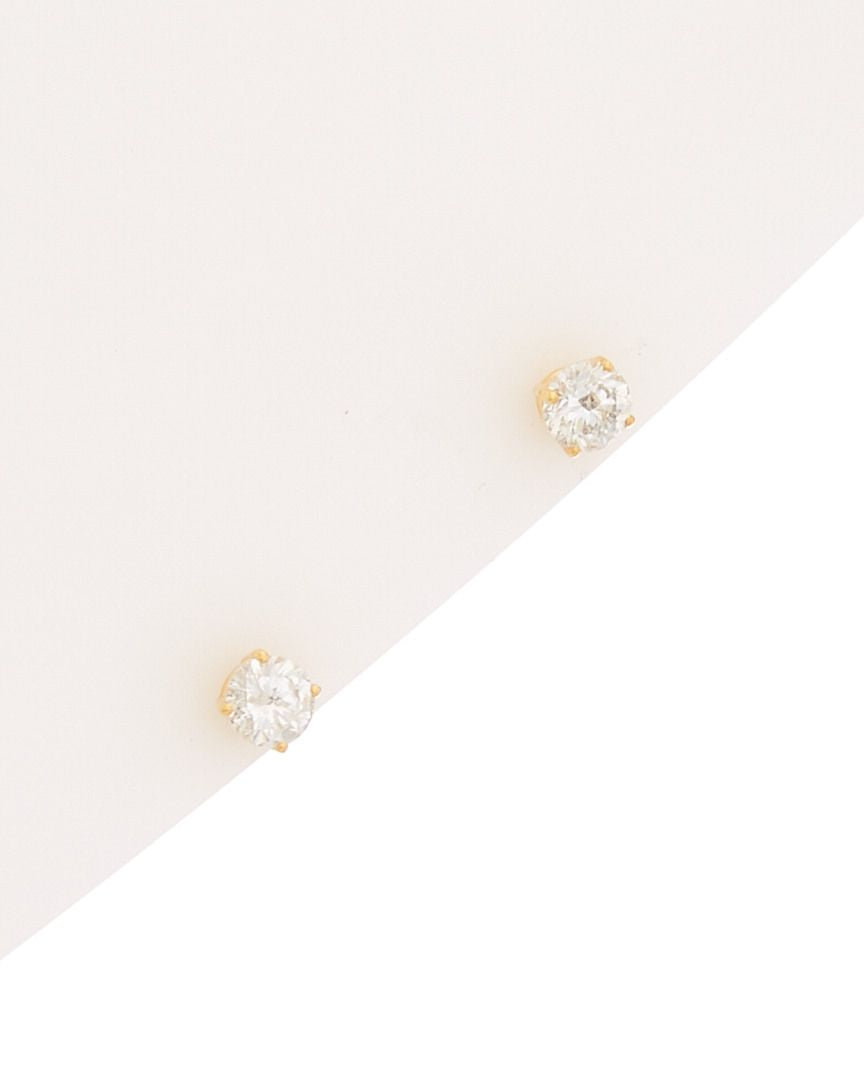 14kt yellow gold diamond stud earrings containing 0.75 cts tw