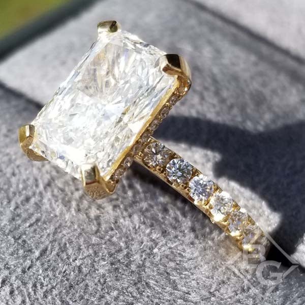 Elongated Radiant Hidden Halo Diamond Engagement Ring