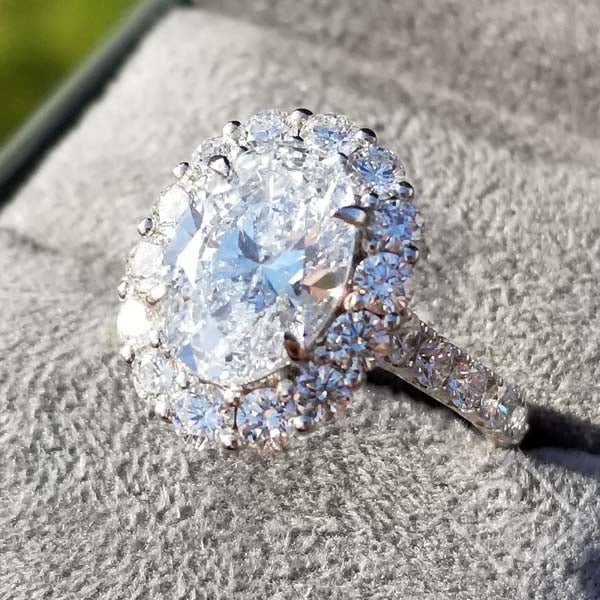 Large Halo Oval Center Diamond Engagement Ring