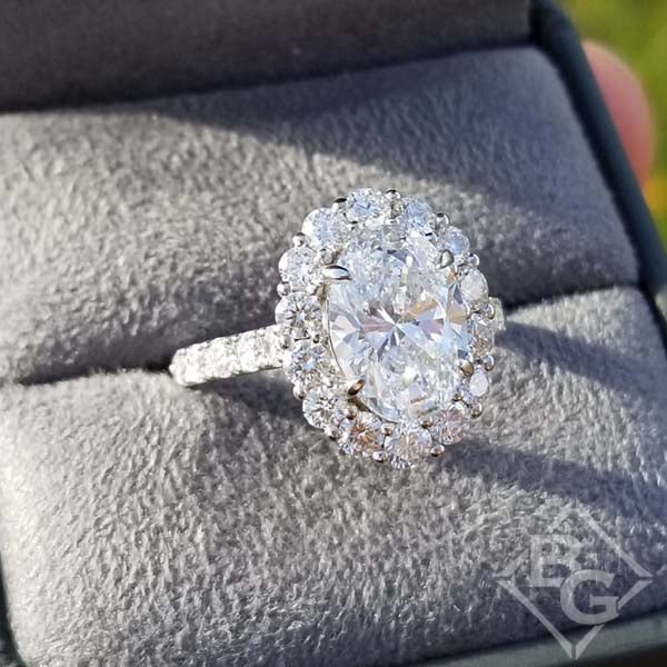Large Halo Oval Center Diamond Engagement Ring