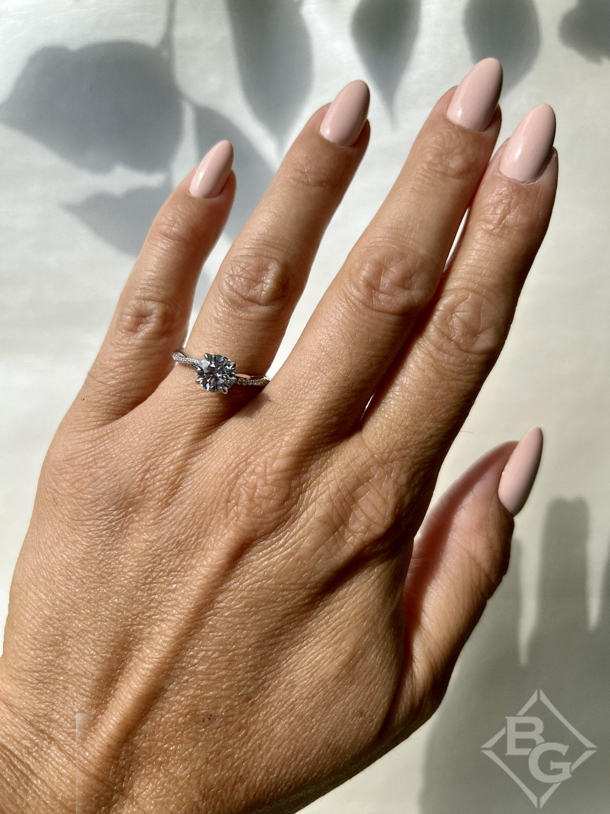 Luna Twist Hidden Halo Diamond Engagement Ring