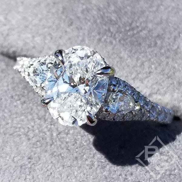 Oval Hidden Halo Diamond Engagement Ring with Pear Cut Sides