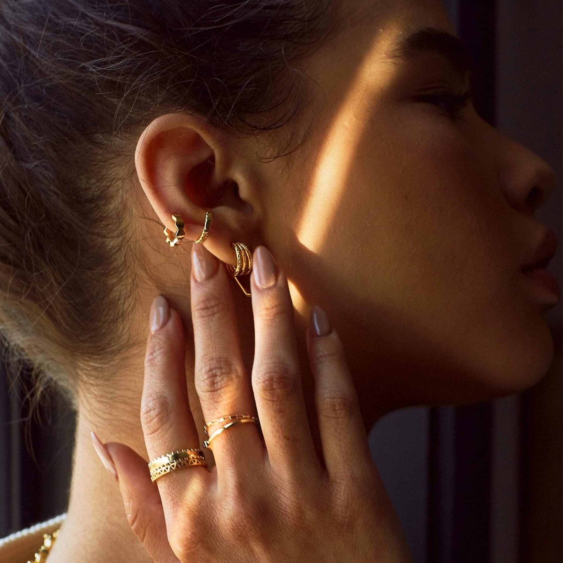 hexagon-huggie-hoop-earrings-18ct-gold-plated-daisy-london