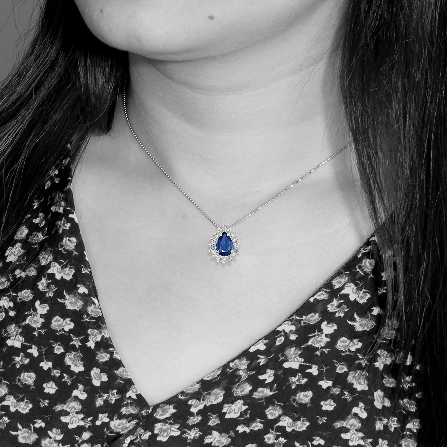 Blue Sapphire Pear Cut Pendant With Prong-Set Diamonds In 18K White Gold