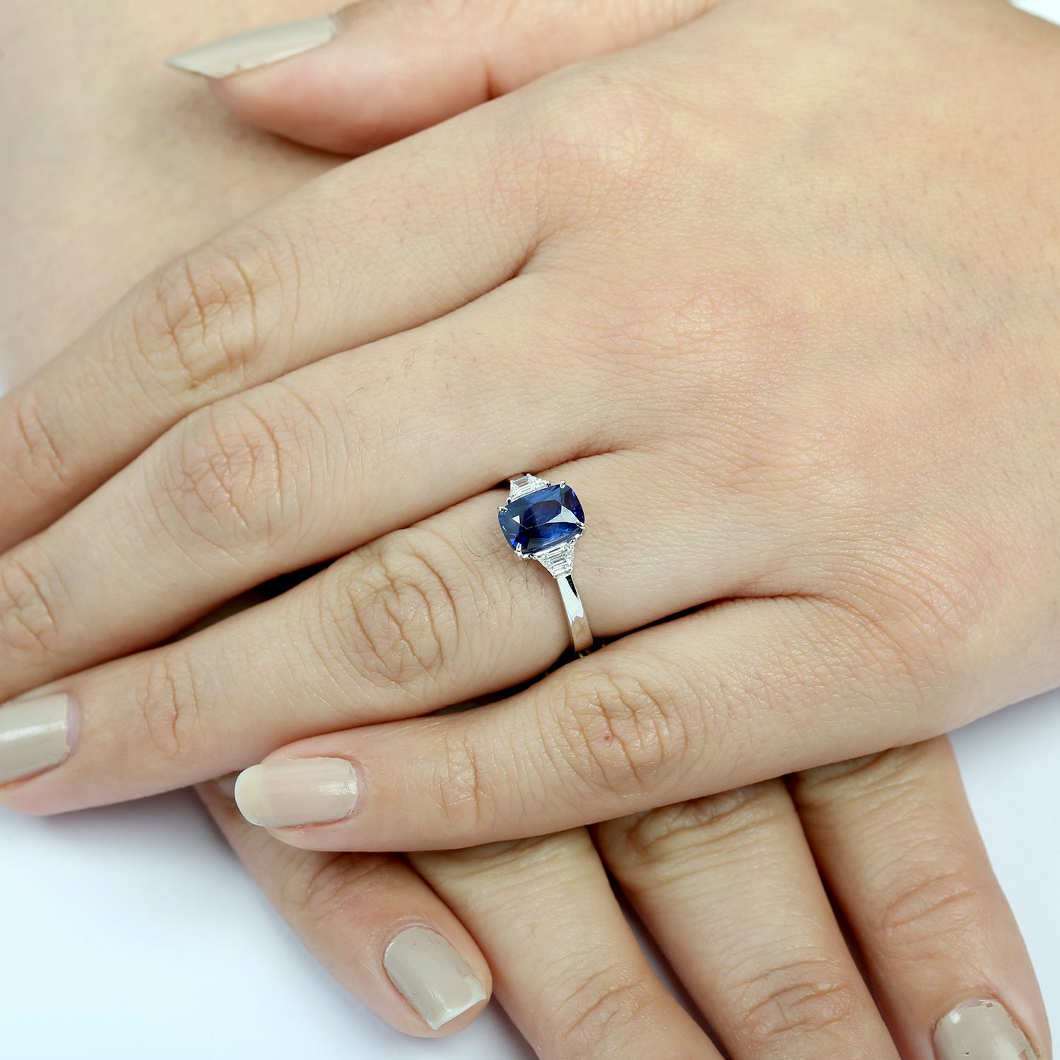 Blue Sapphire & Tapered Baguette Diamond Three Stone Ring In White Gold