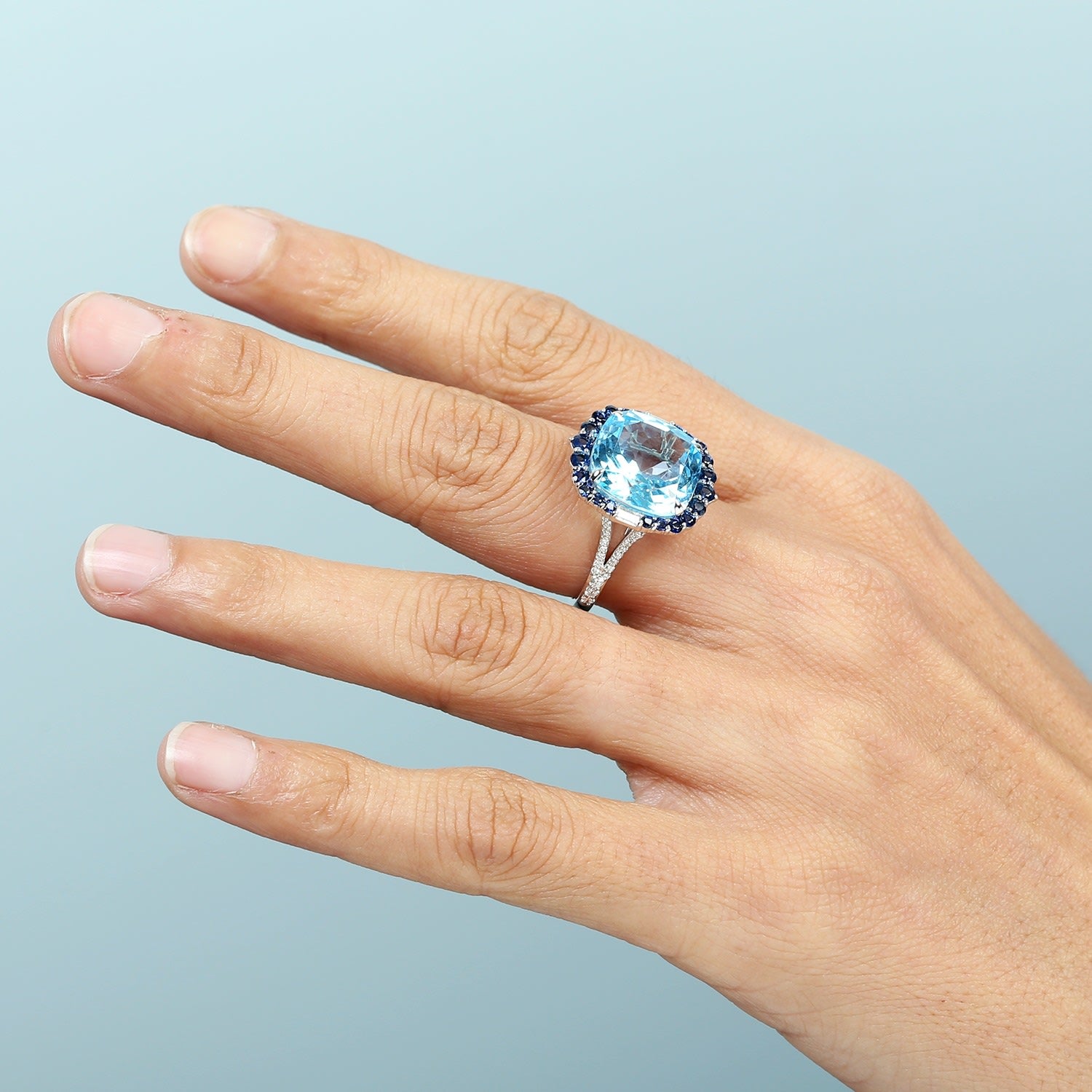 Cushion Blue Topaz Cocktail Ring With Sapphire Halo In 14K White Gold