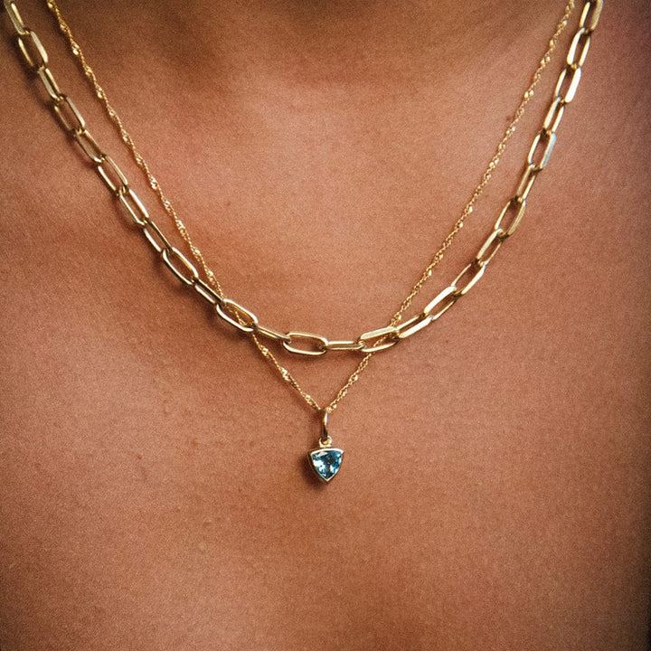 blue-topaz-december-birthstone-charm-necklace-18ct-gold-plated-daisy-london
