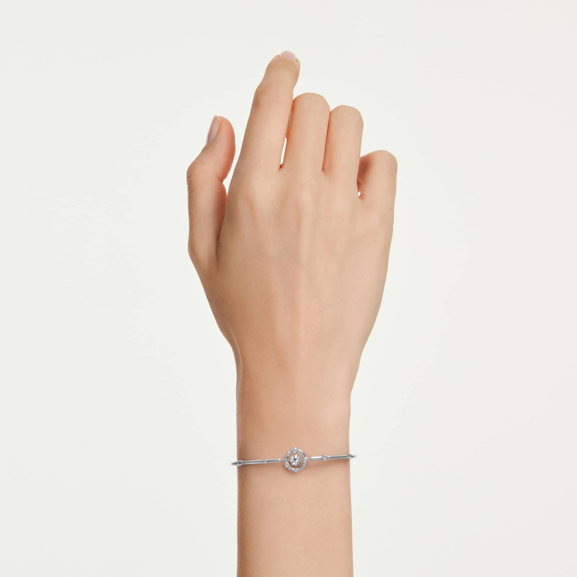 CONSTELLA BANGLE ROUND CUT DANCING STONE WHITE RHODIUM PLATED