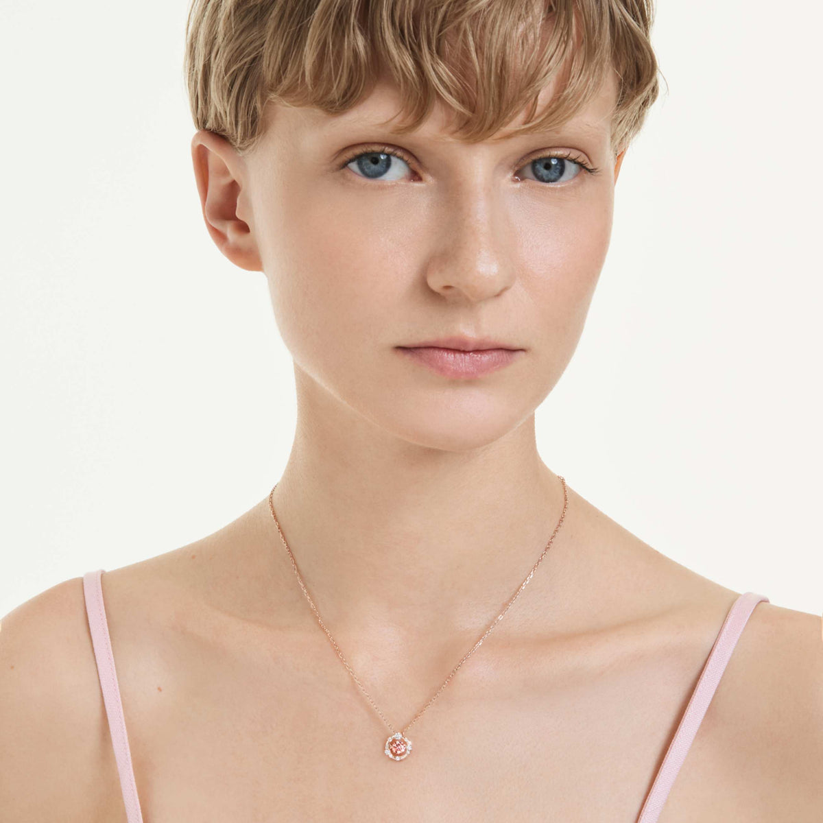 CONSTELLA PENDANT ROUND CUT DANCING STONE PINK ROSE GOLD TONE PLATED