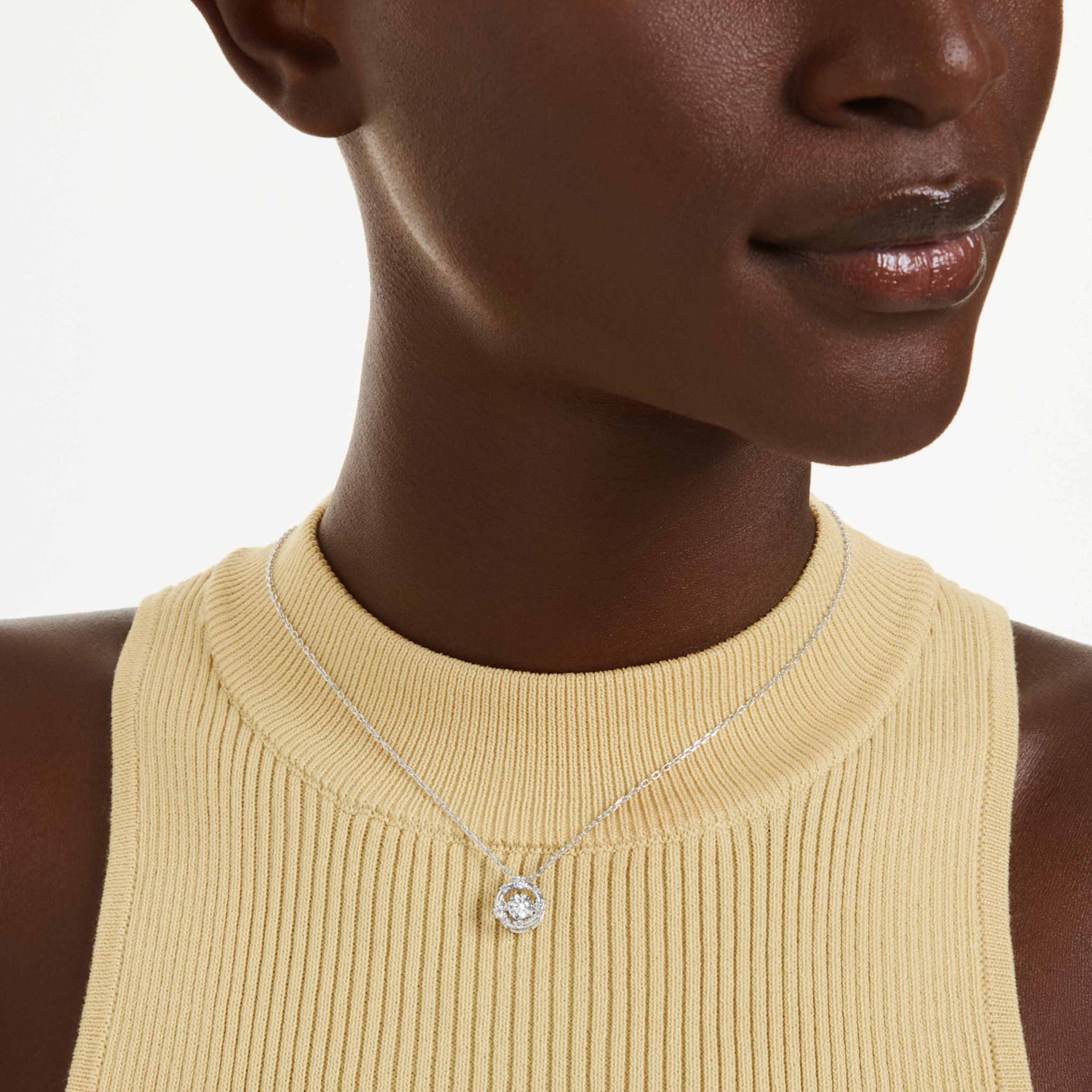 CONSTELLA PENDANT ROUND CUT DANCING STONE WHITE RHODIUM PLATED