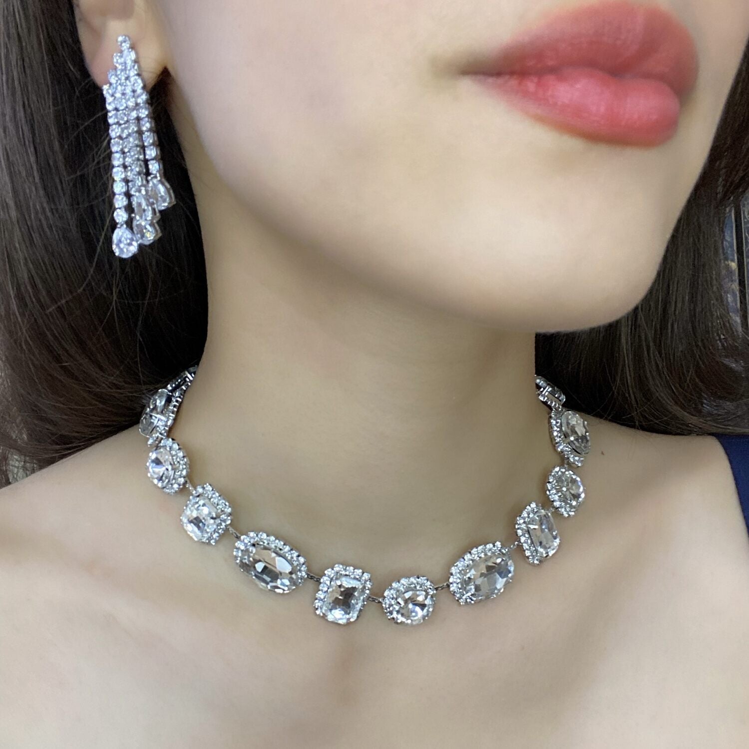 Sparkling Cubic Zirconia Rhodium Plated Earrings With Pear-Shaped Drop Stones