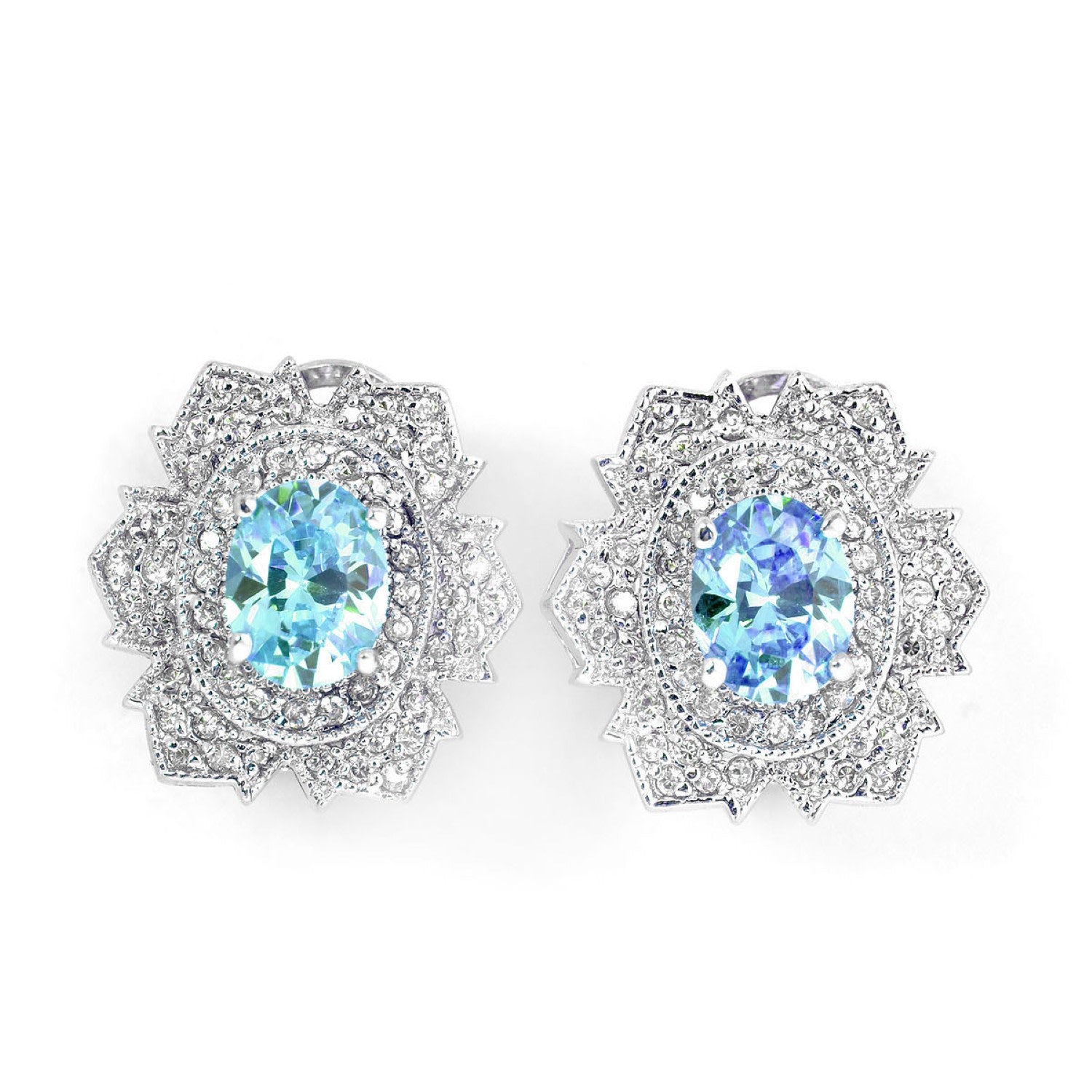 Sterling Silver White Gold Plated With Oval Blue Topaz Cubic Zirconia Flower Shape Stud Earrings