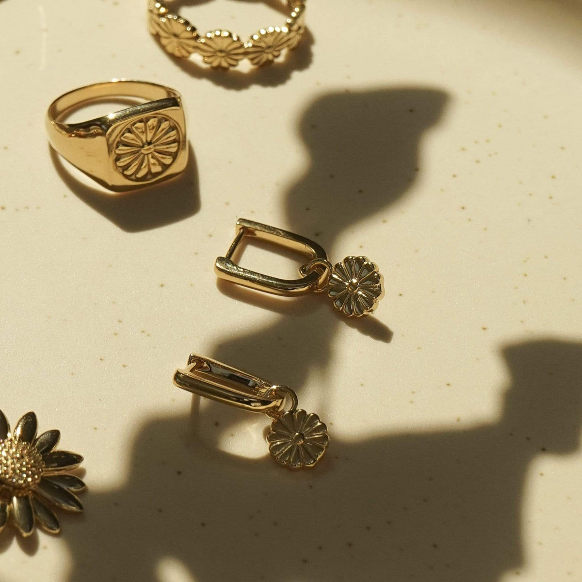 daisy-bloom-drop-huggie-earrings-18ct-gold-plated-daisy-london