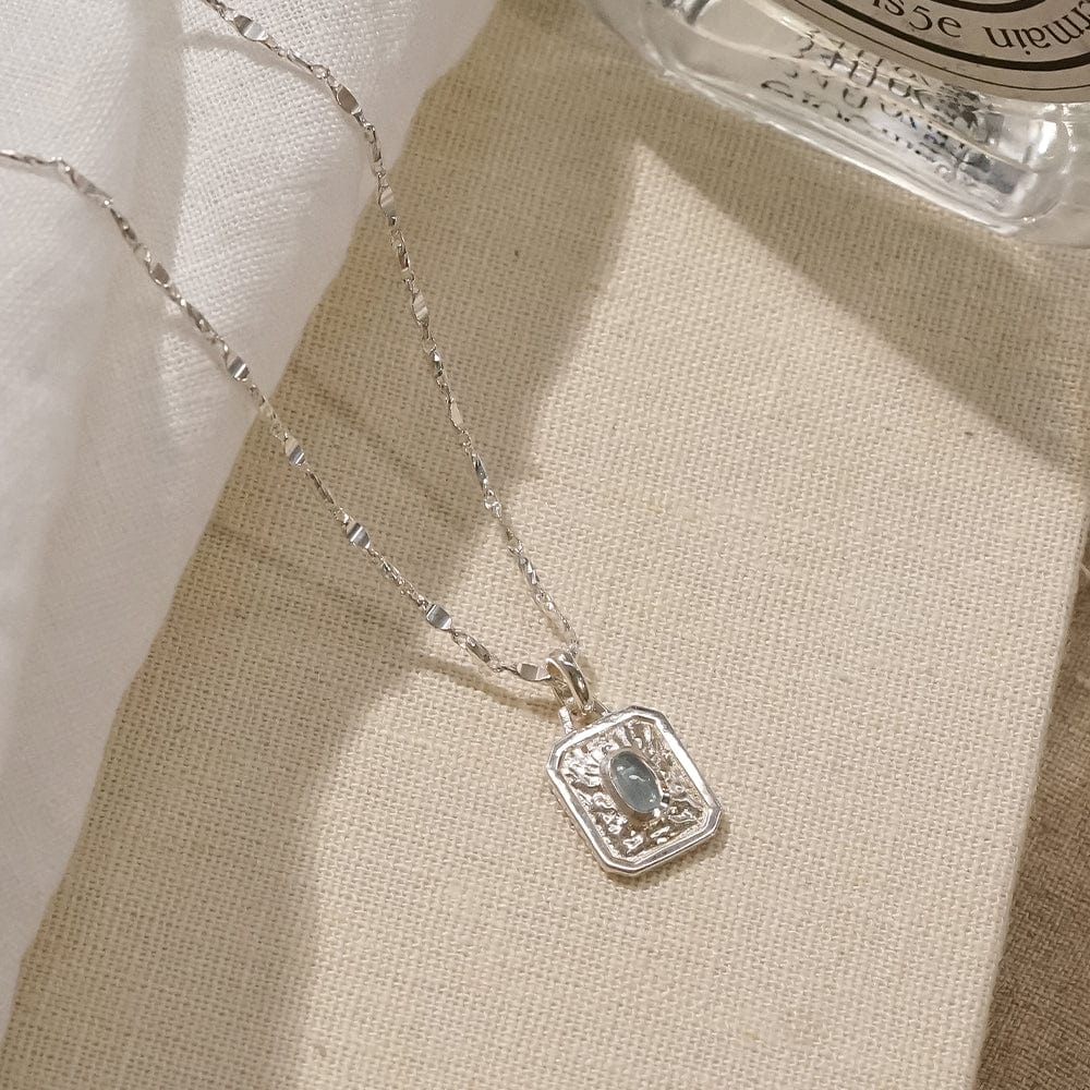 december-blue-topaz-birthstone-necklace-sterling-silver-daisy-london