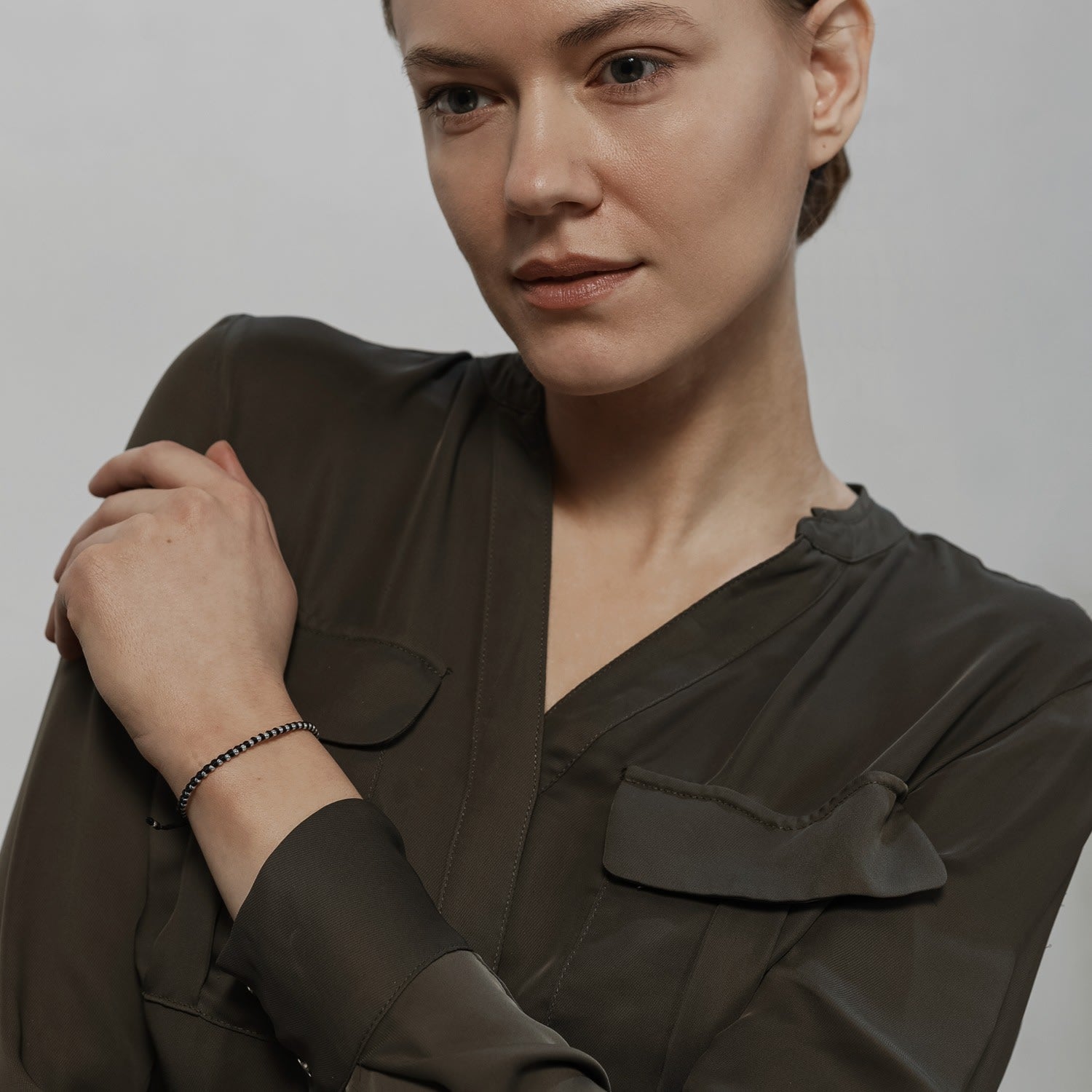 Dainty Blue Handmade Friendship Bracelet With Tiny Silver Beads - Spitafields