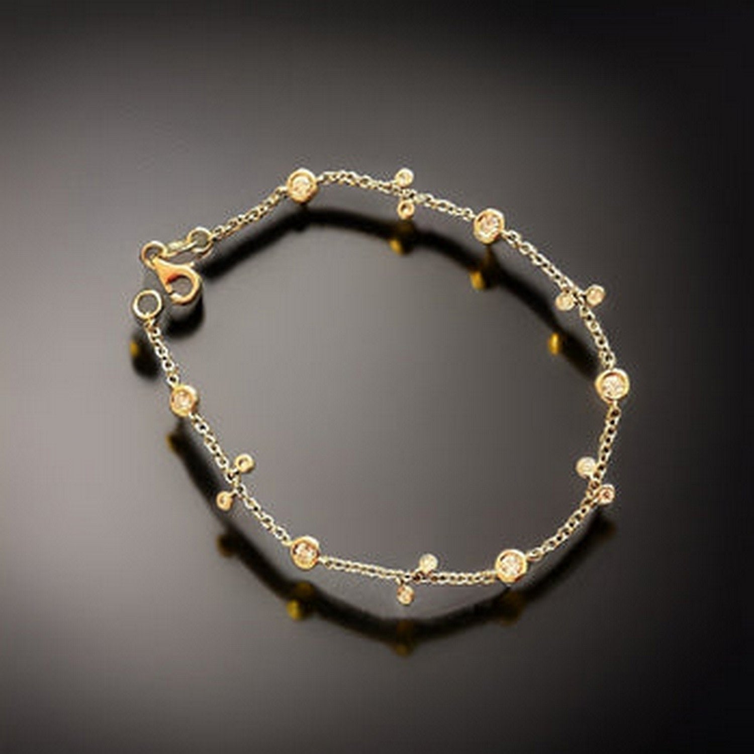 Diamond Bracelet Bezel And Charms Station Chain In Gold