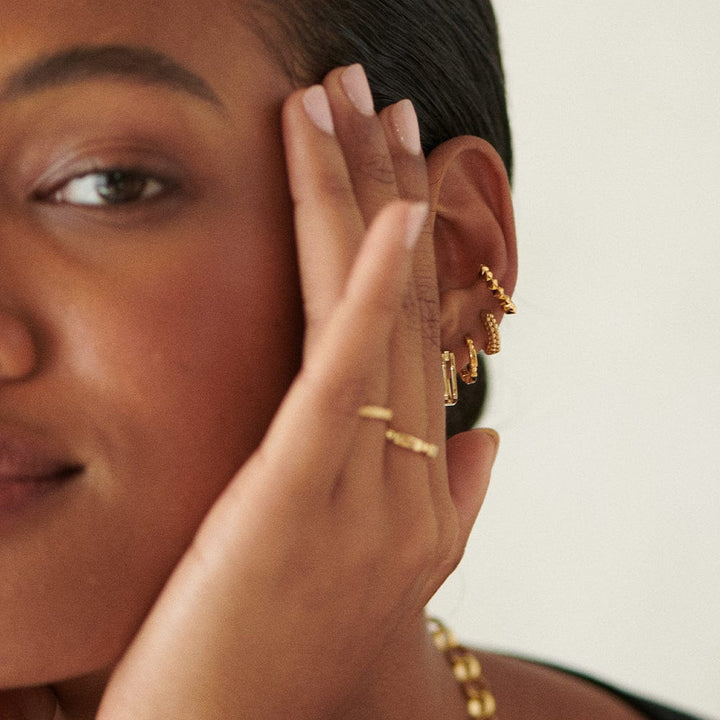 mini-ball-huggie-hoop-earrings-18ct-gold-plated-daisy-london