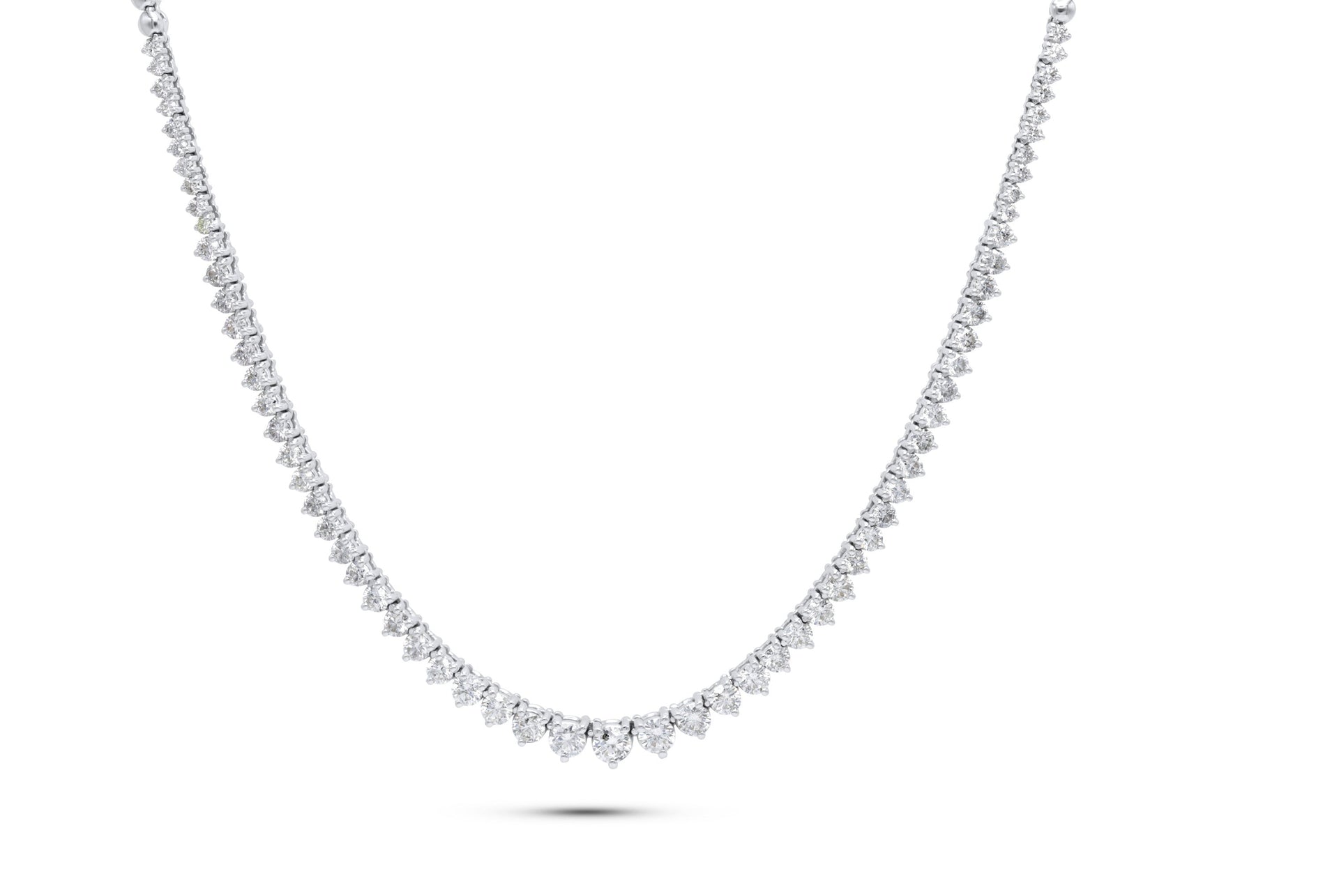 18KT WG HALF-GRADUATED TENNIS NECKLACE FEATURES 5.15CTS ROUND DIAMONDS