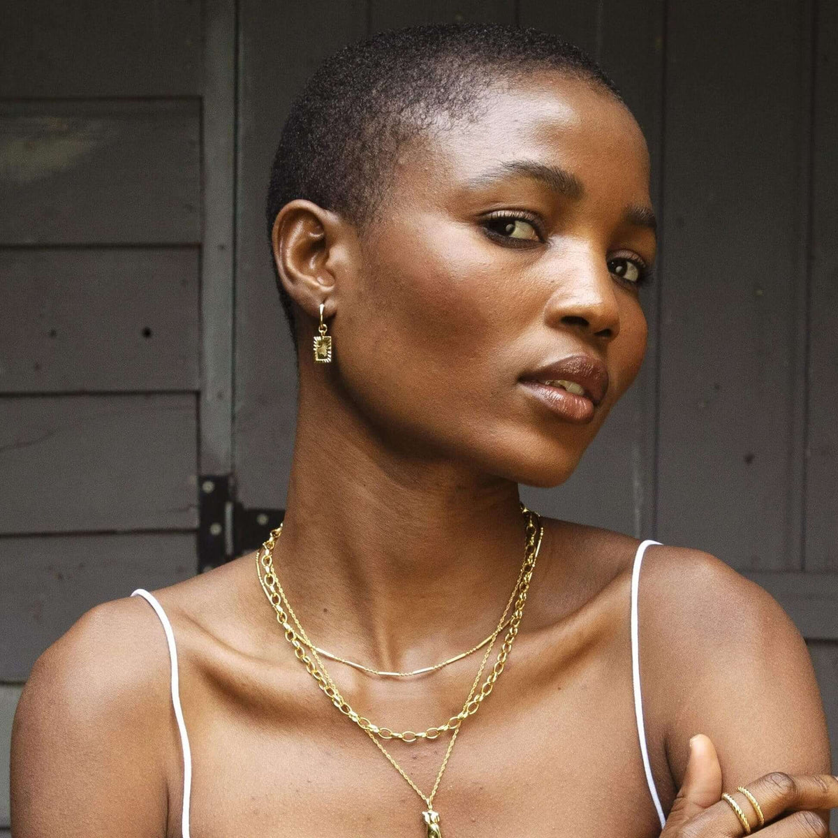 estee-lalonde-rising-sun-frame-charm-earrings-daisy-london