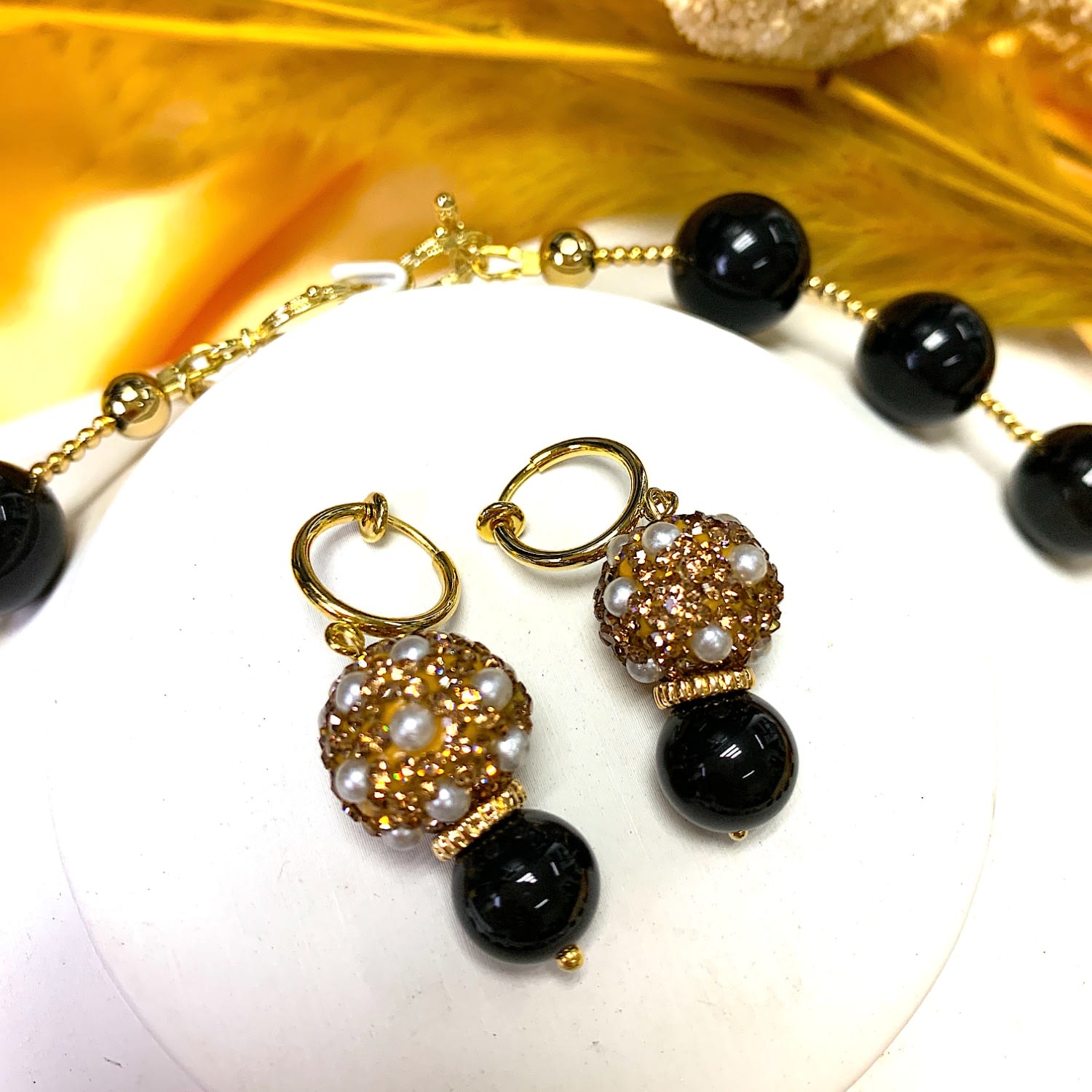 Round Rhinestones Bordered Pearls With Obsidian Clip On Earrings