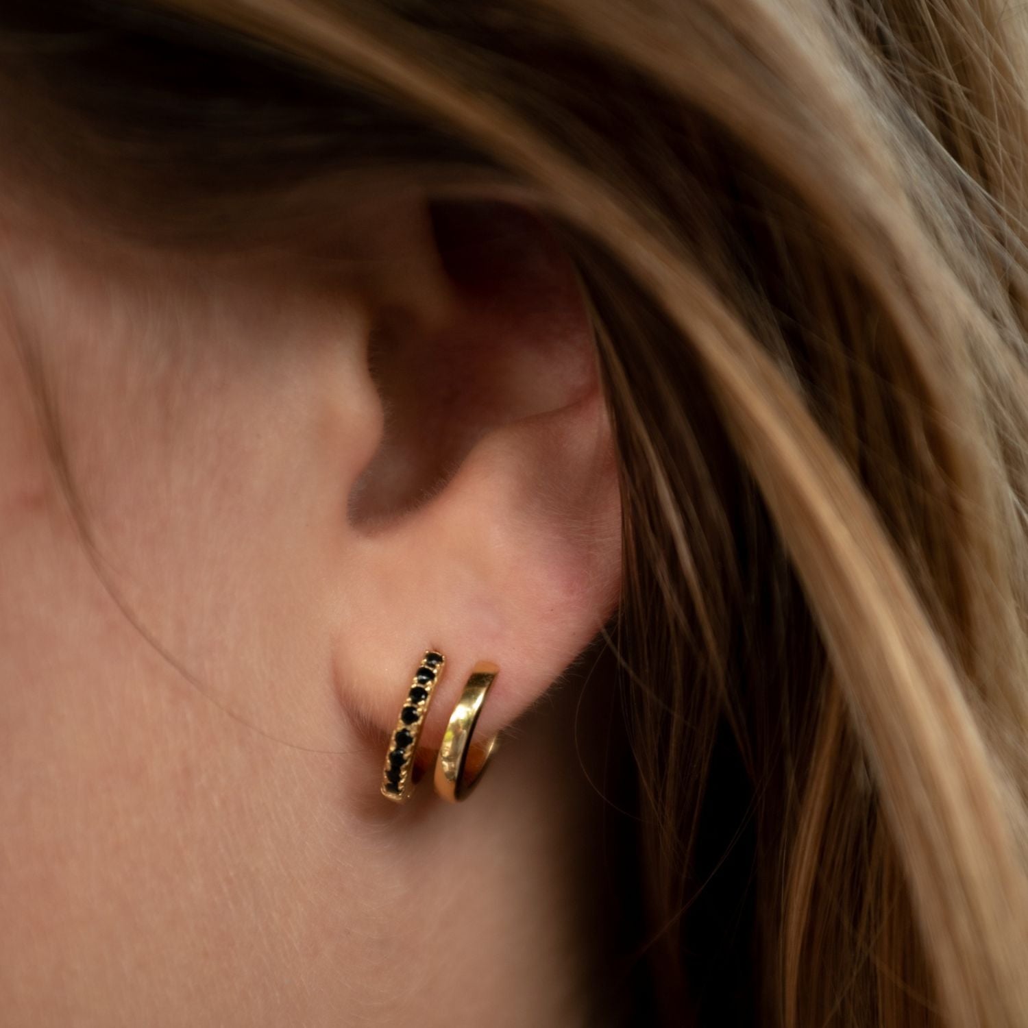 Gold Mismatched Double Huggie Earrings With Black Stones